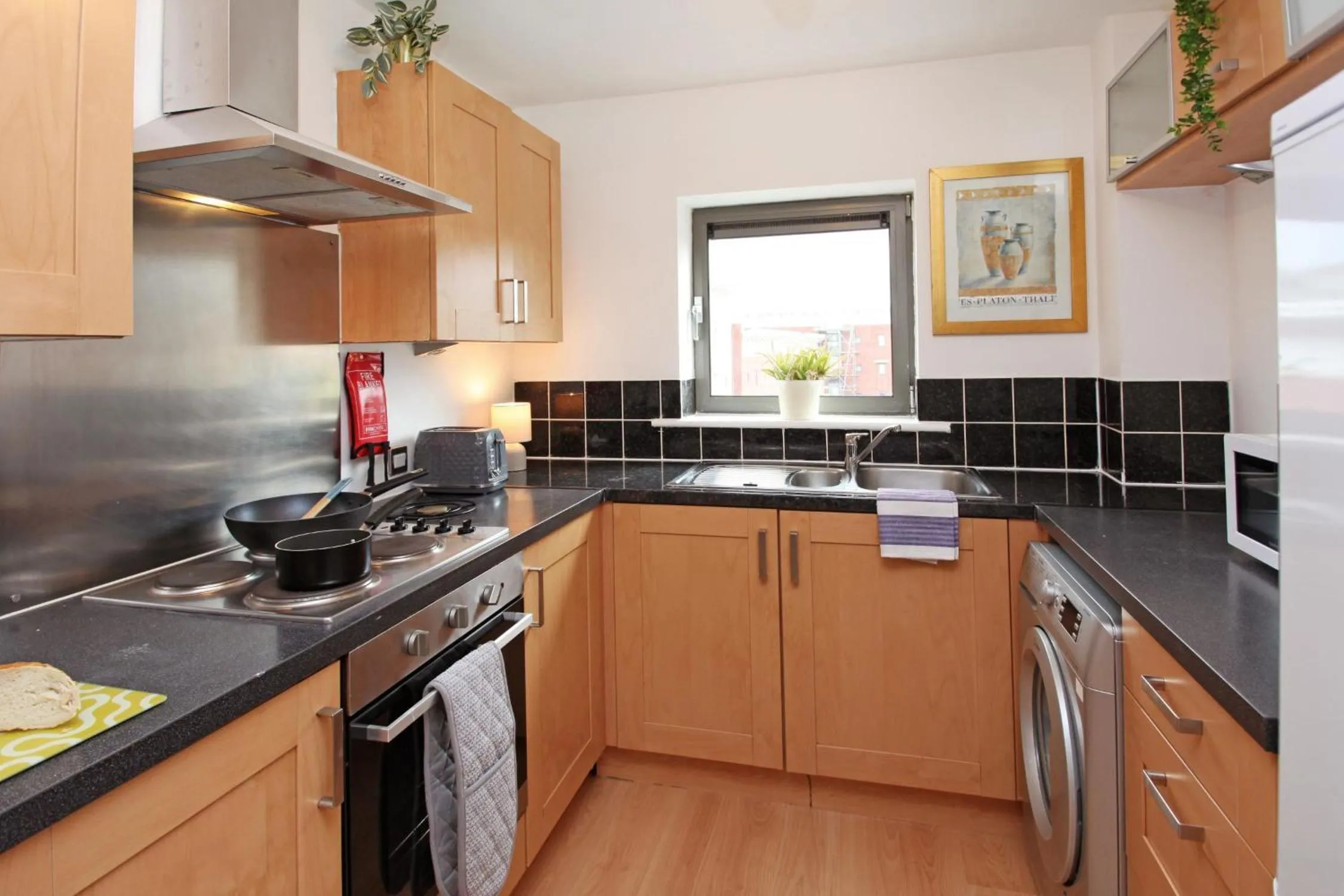Kitchen or kitchenette in Albion Street Apartments