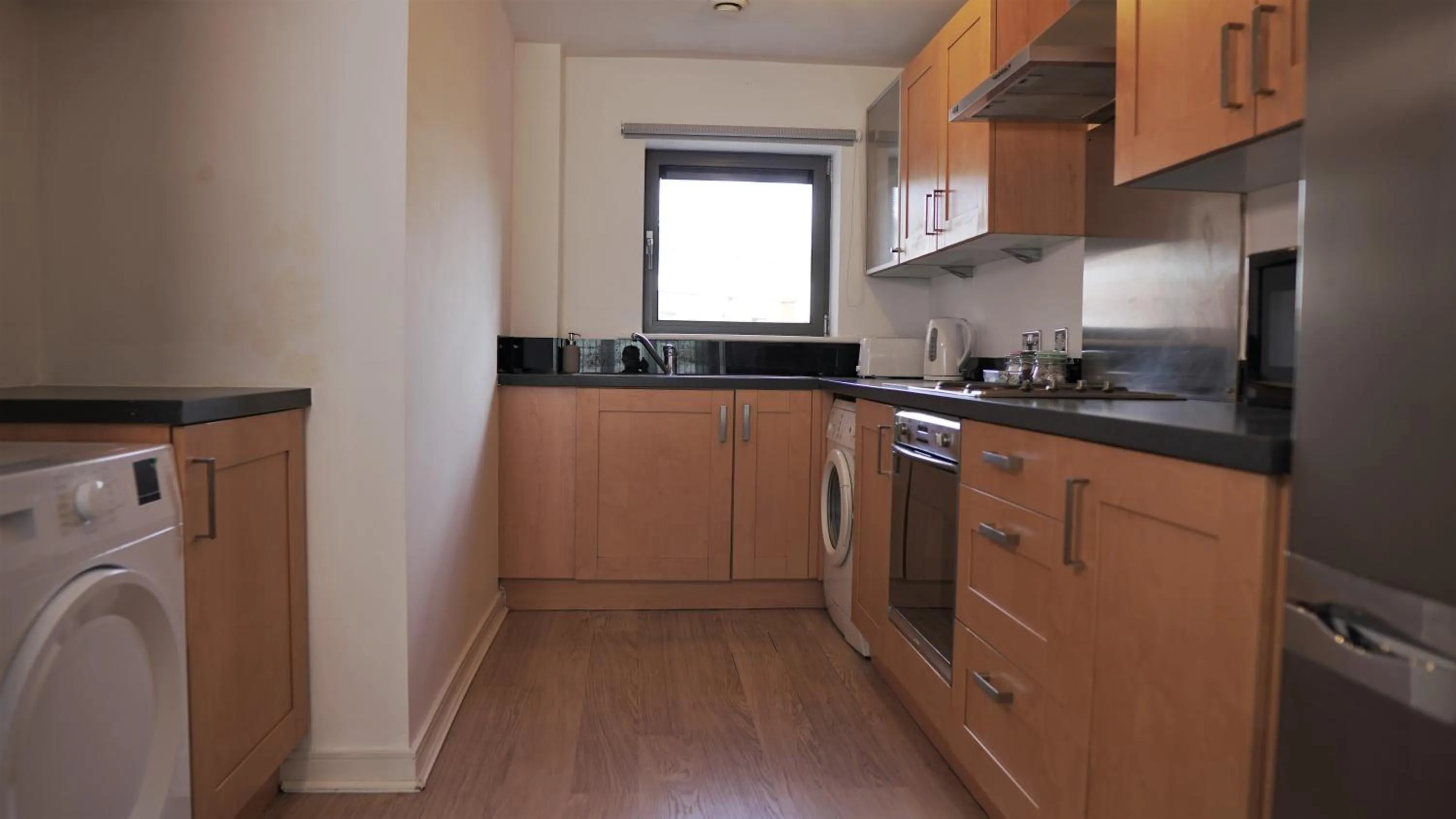 Kitchen or kitchenette in Albion Street Apartments