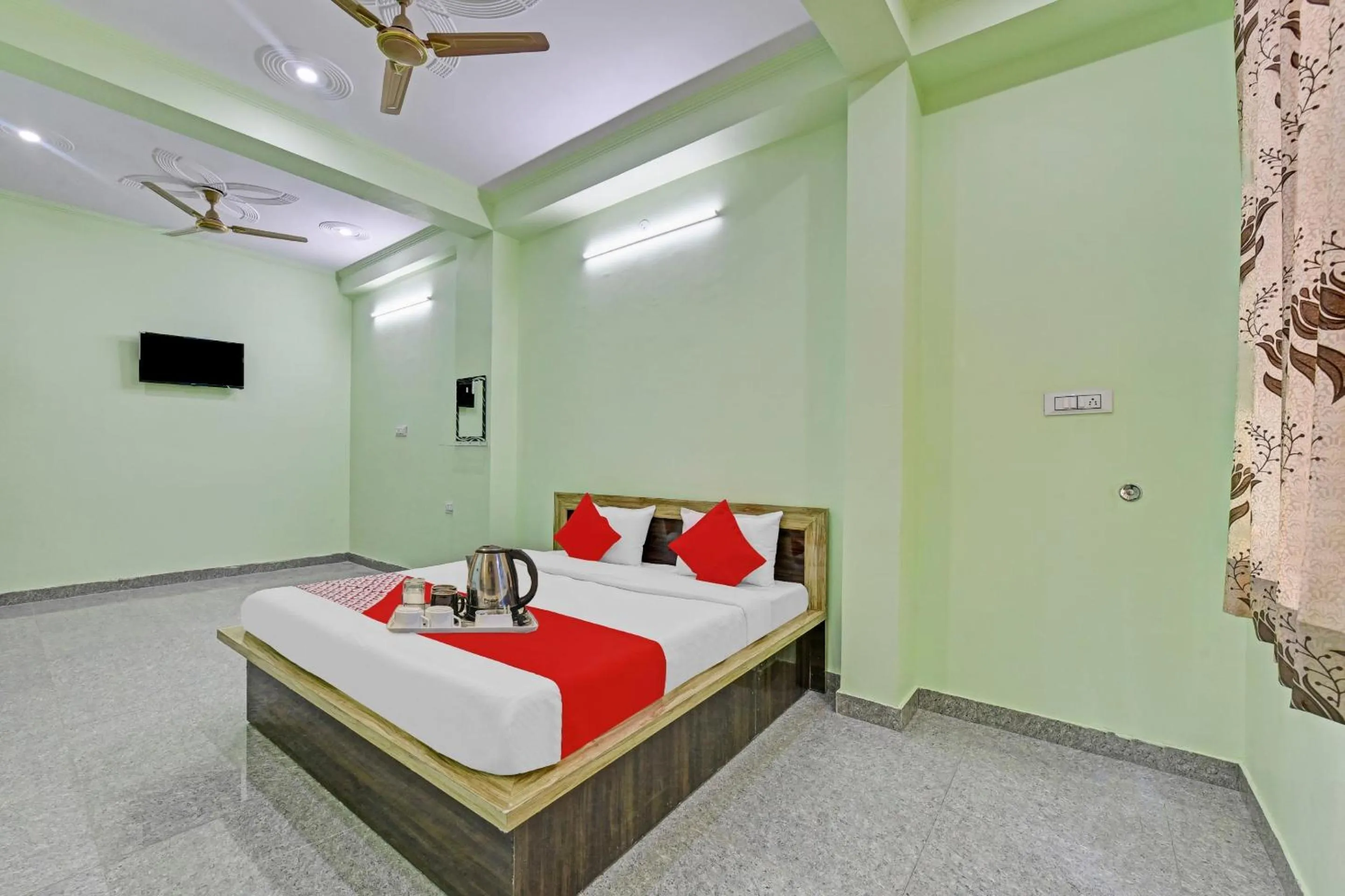 Bedroom in Hotel O Jmd Hotel