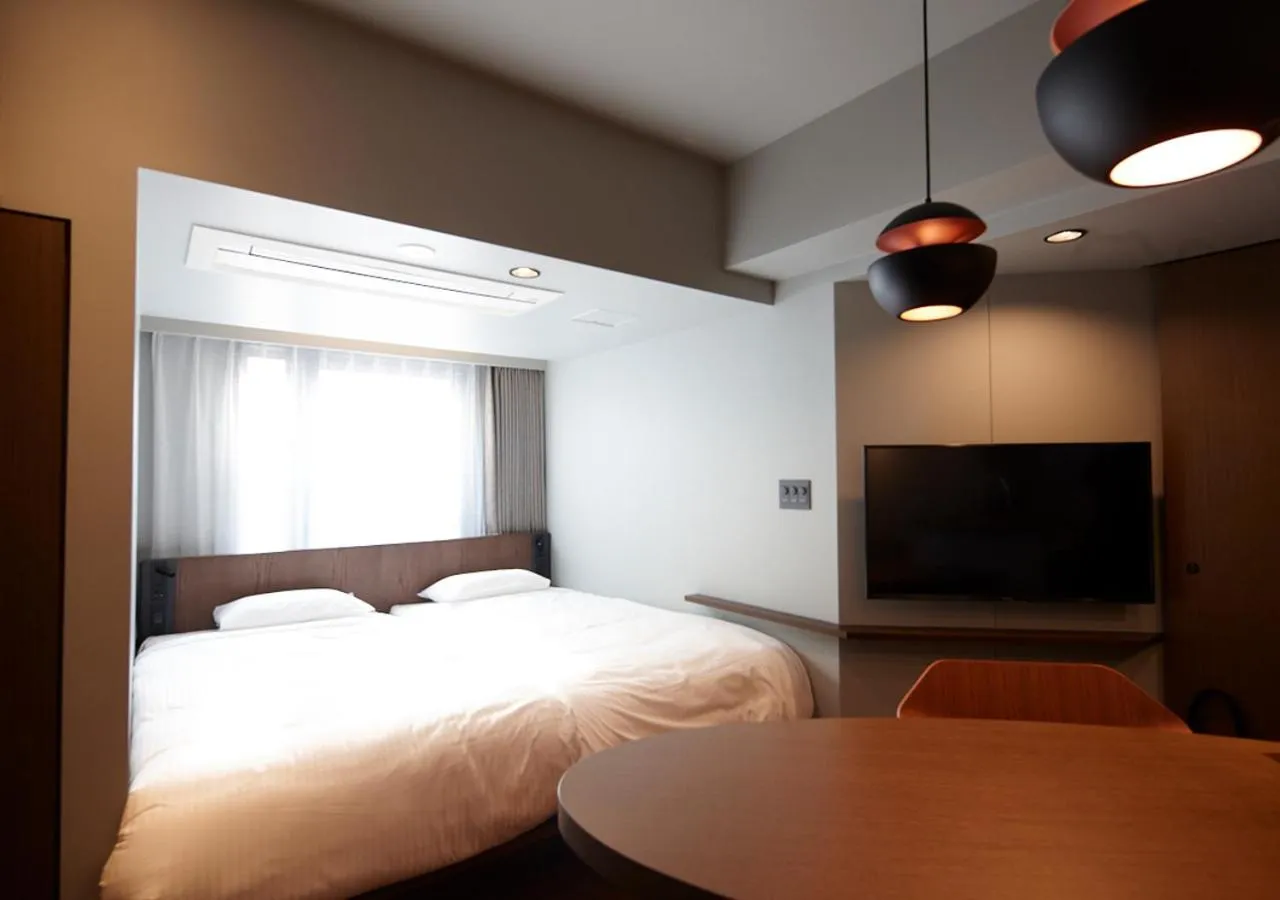 Bed in COCOSHUKU AKASAKA Premium