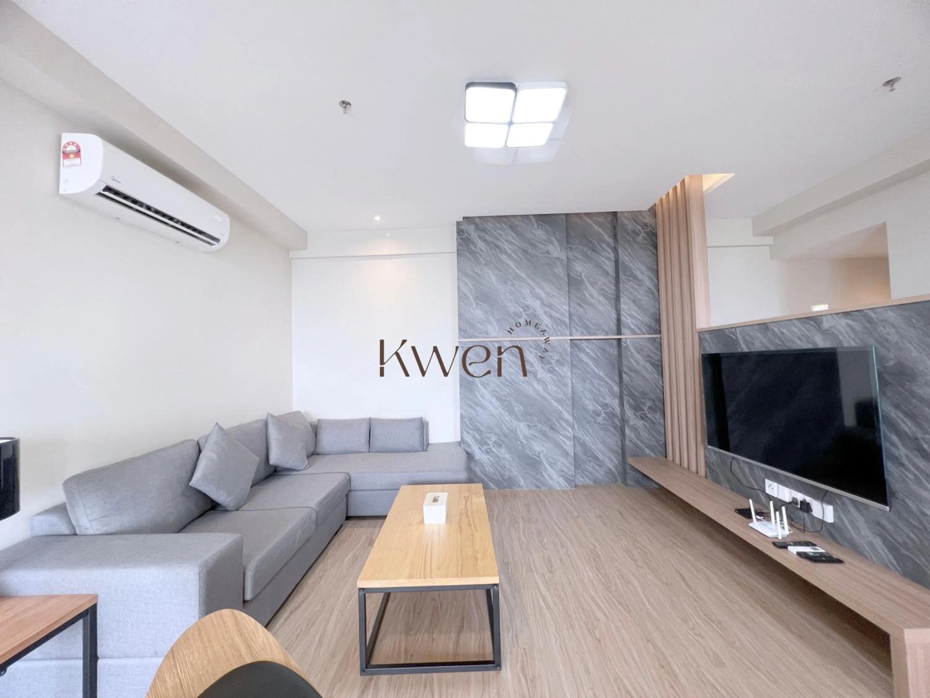 Living room in KWEN Suites-Tanjung Aru InfinityPool Seaview/Airport View