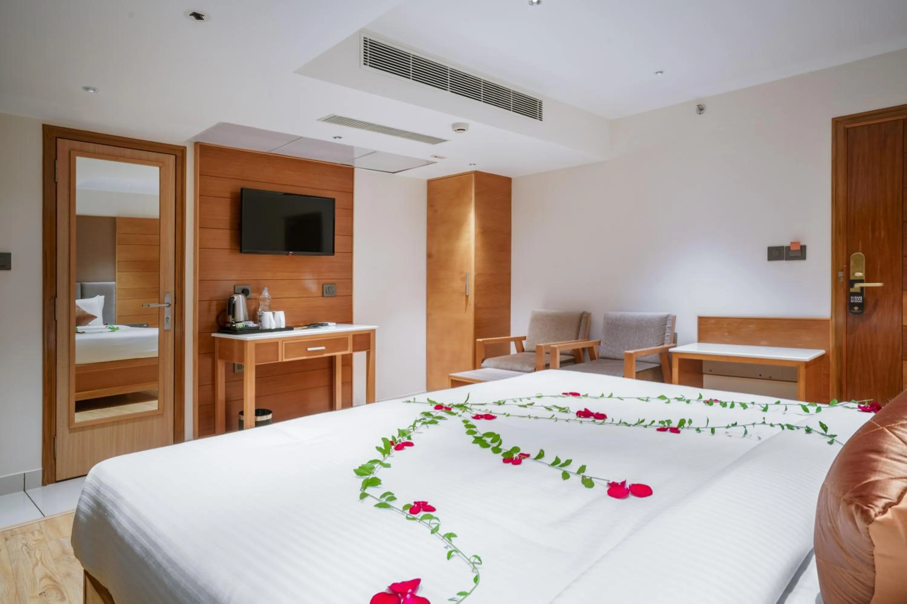 Bed in Townbridge Hotels & Suites