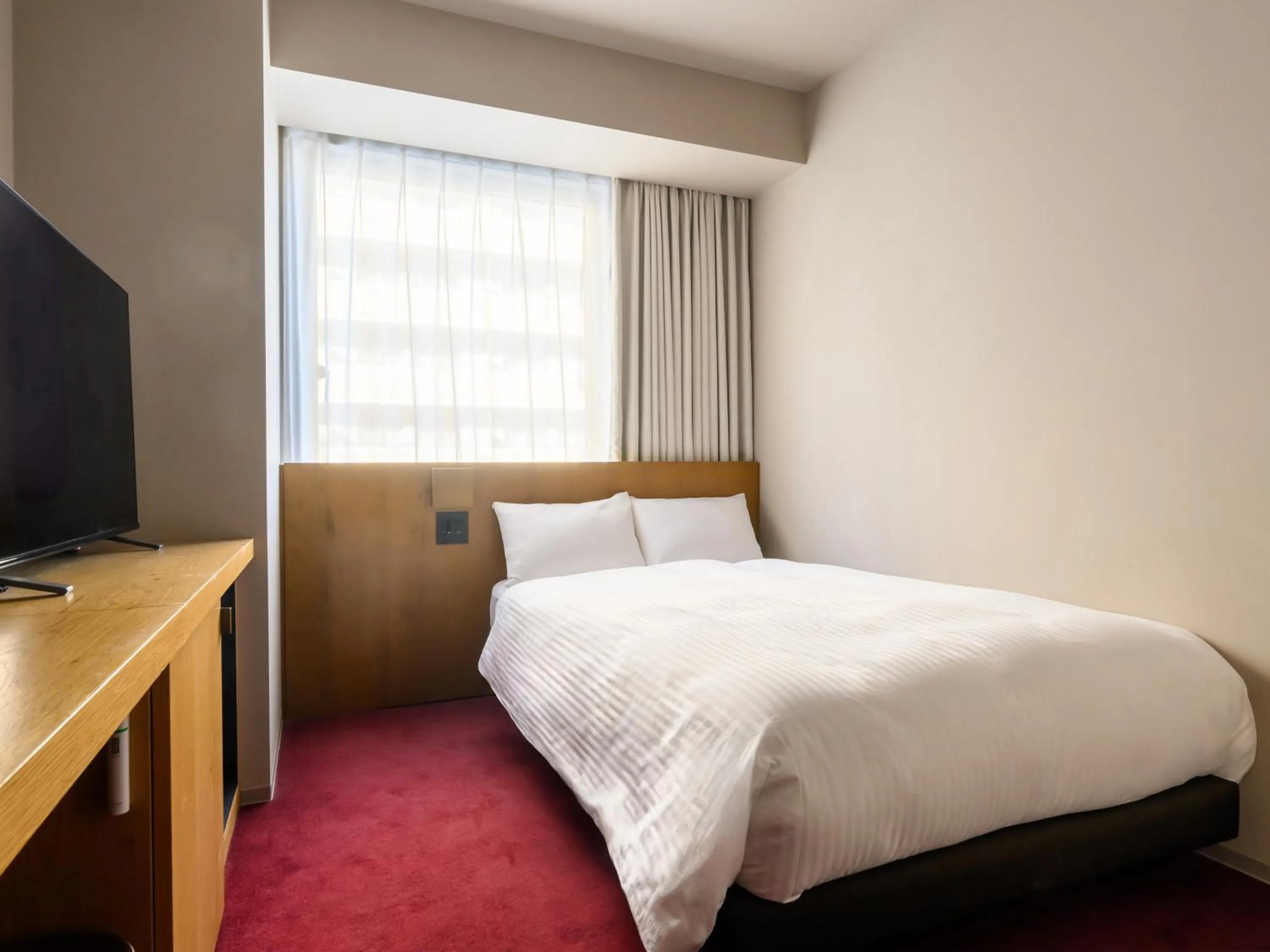 Photo of the whole room, Bed in hotel androoms Sapporo Susukino