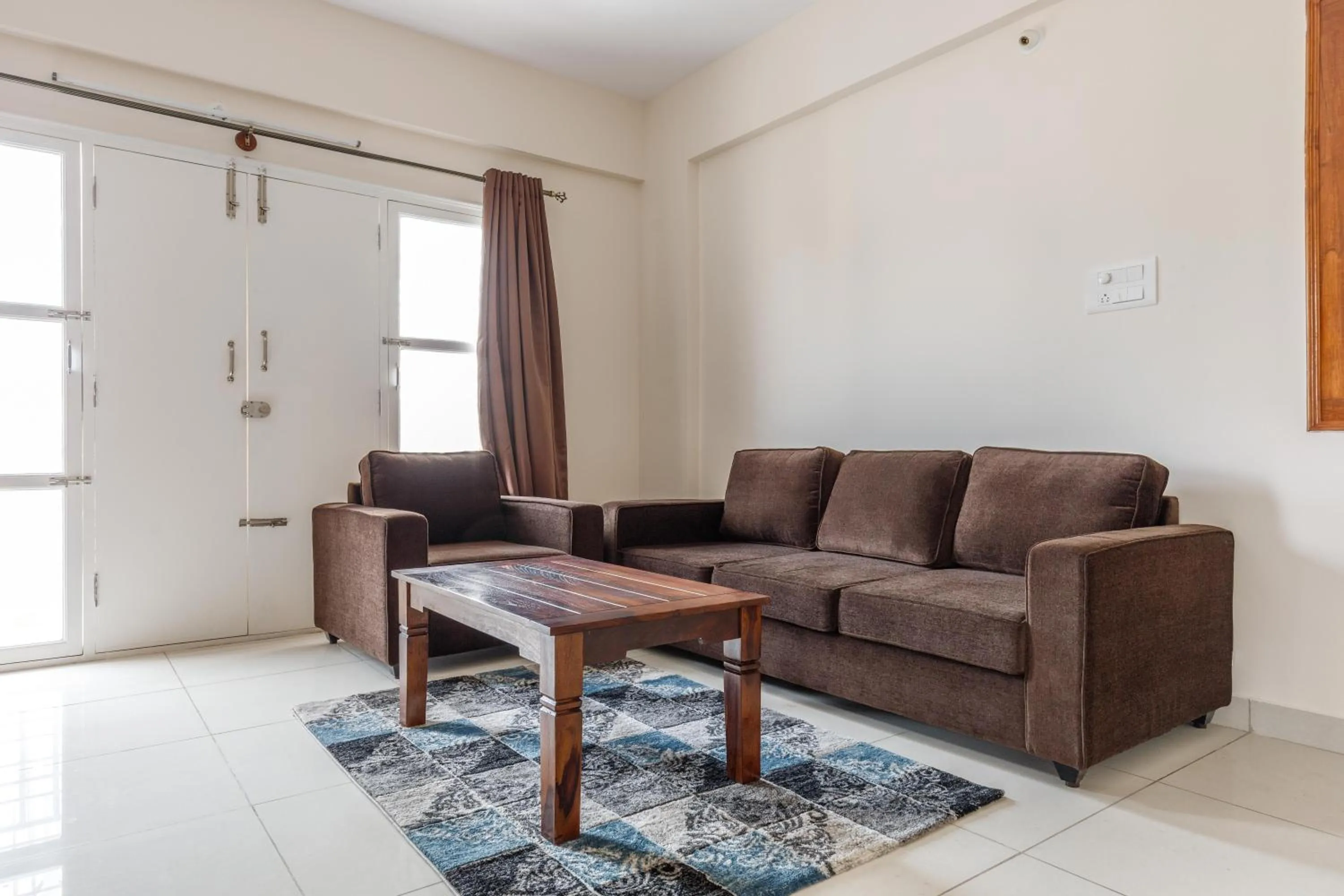 Living room in Pinnacle Serviced Apartments