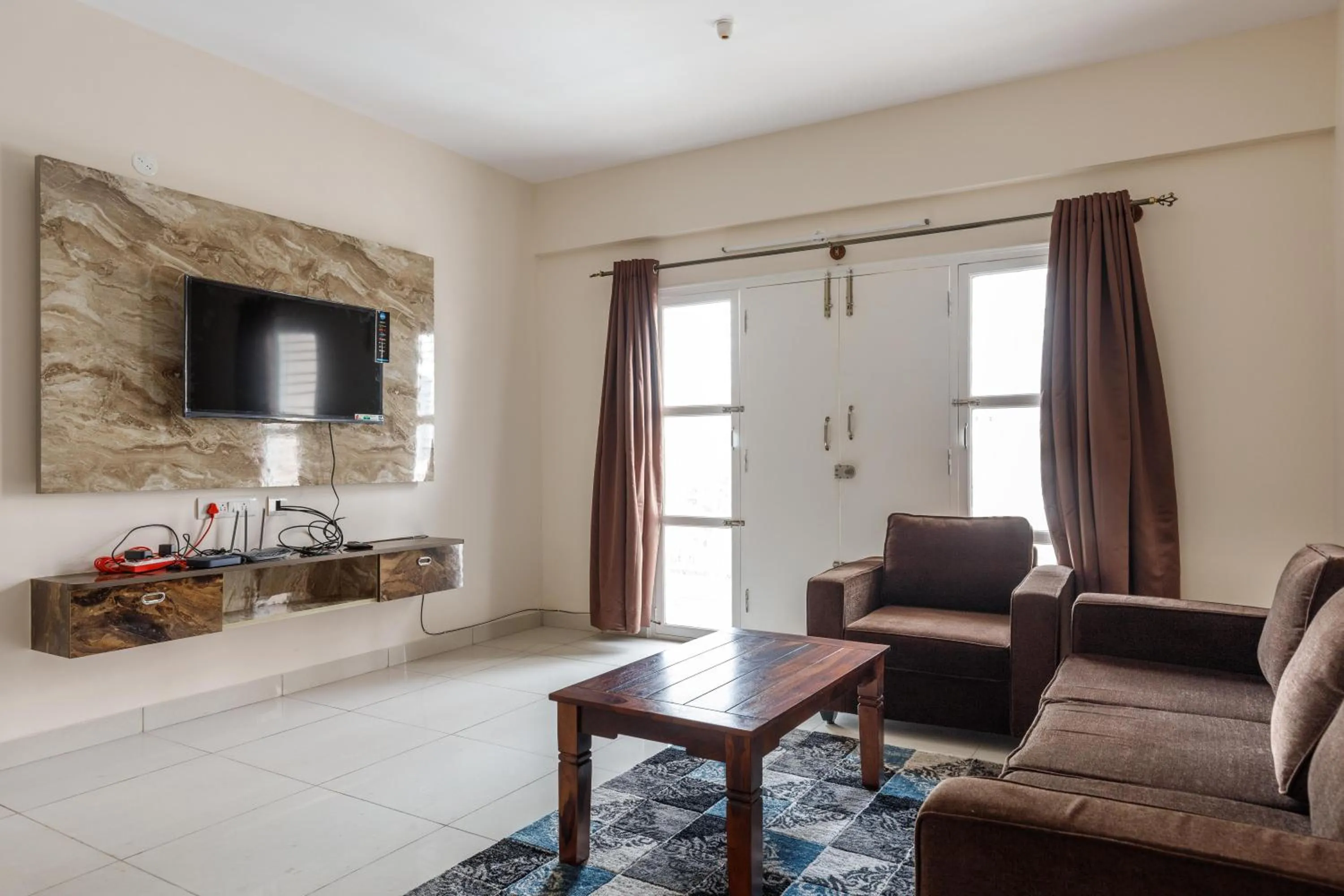 Living room in Pinnacle Serviced Apartments