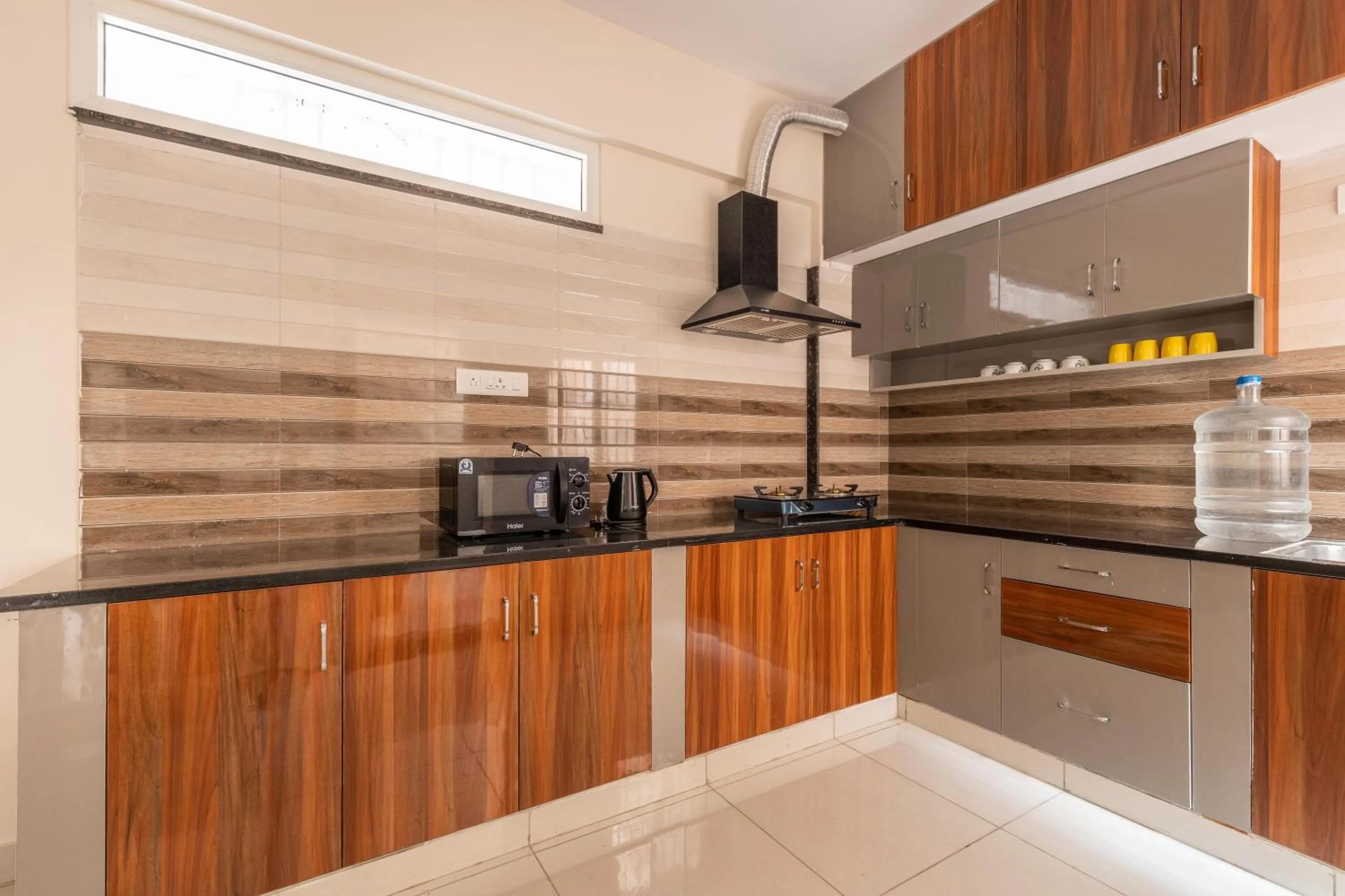 Kitchen or kitchenette in Pinnacle Serviced Apartments