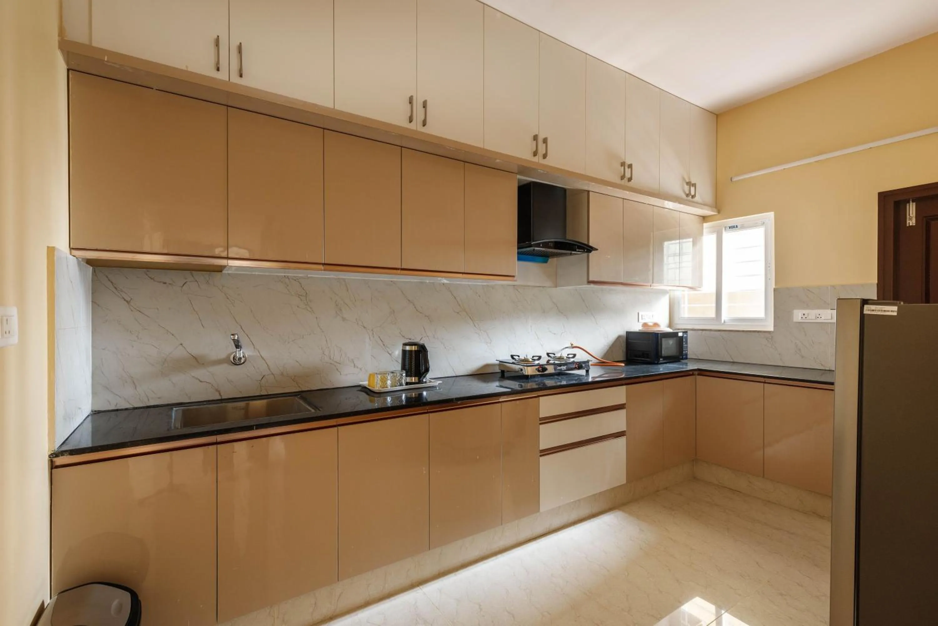 Kitchen or kitchenette in Pinnacle Serviced Apartments