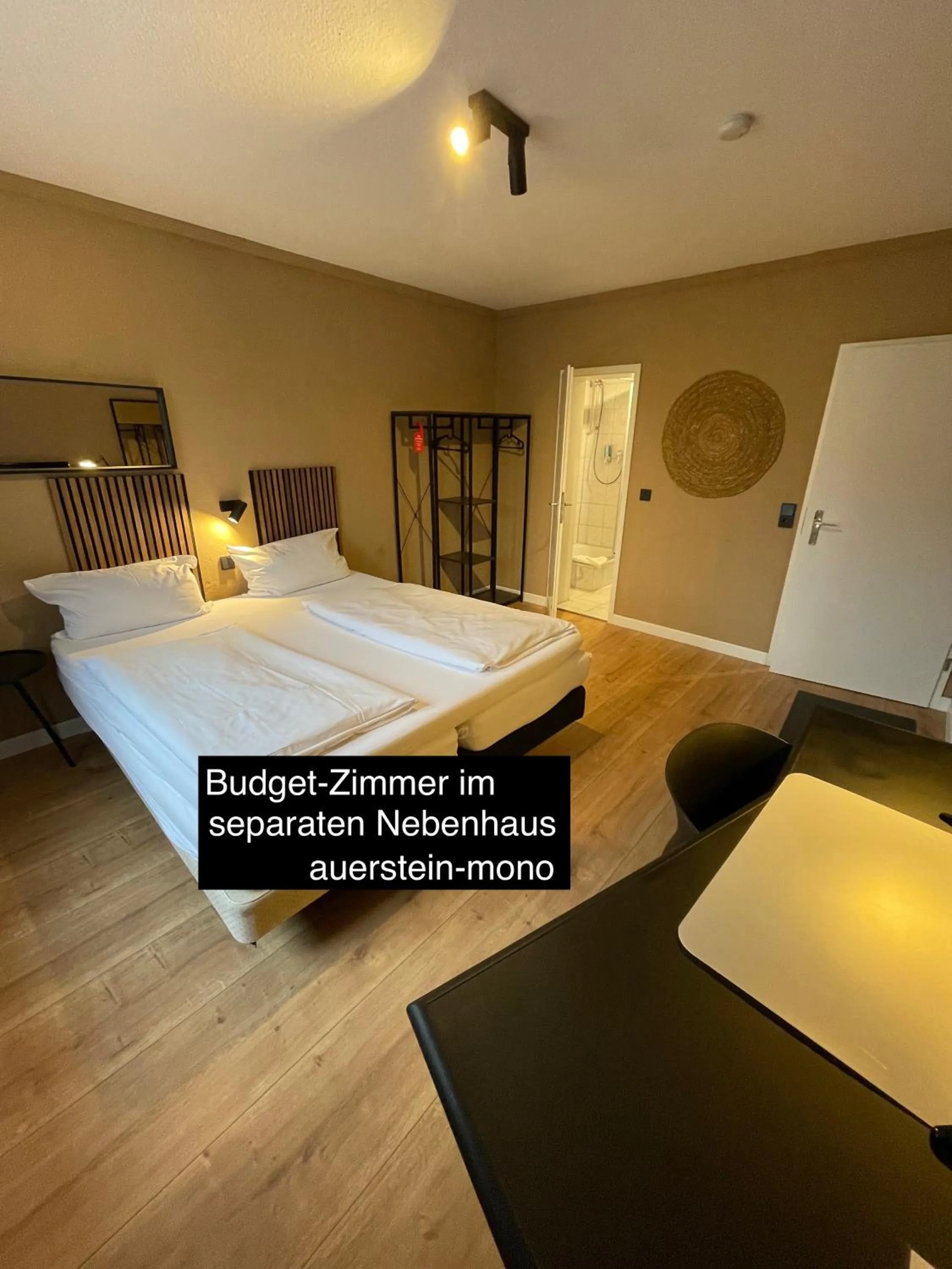 Living room, Bed in AUERSTEIN-Hotels auerstein & auerstein-mono