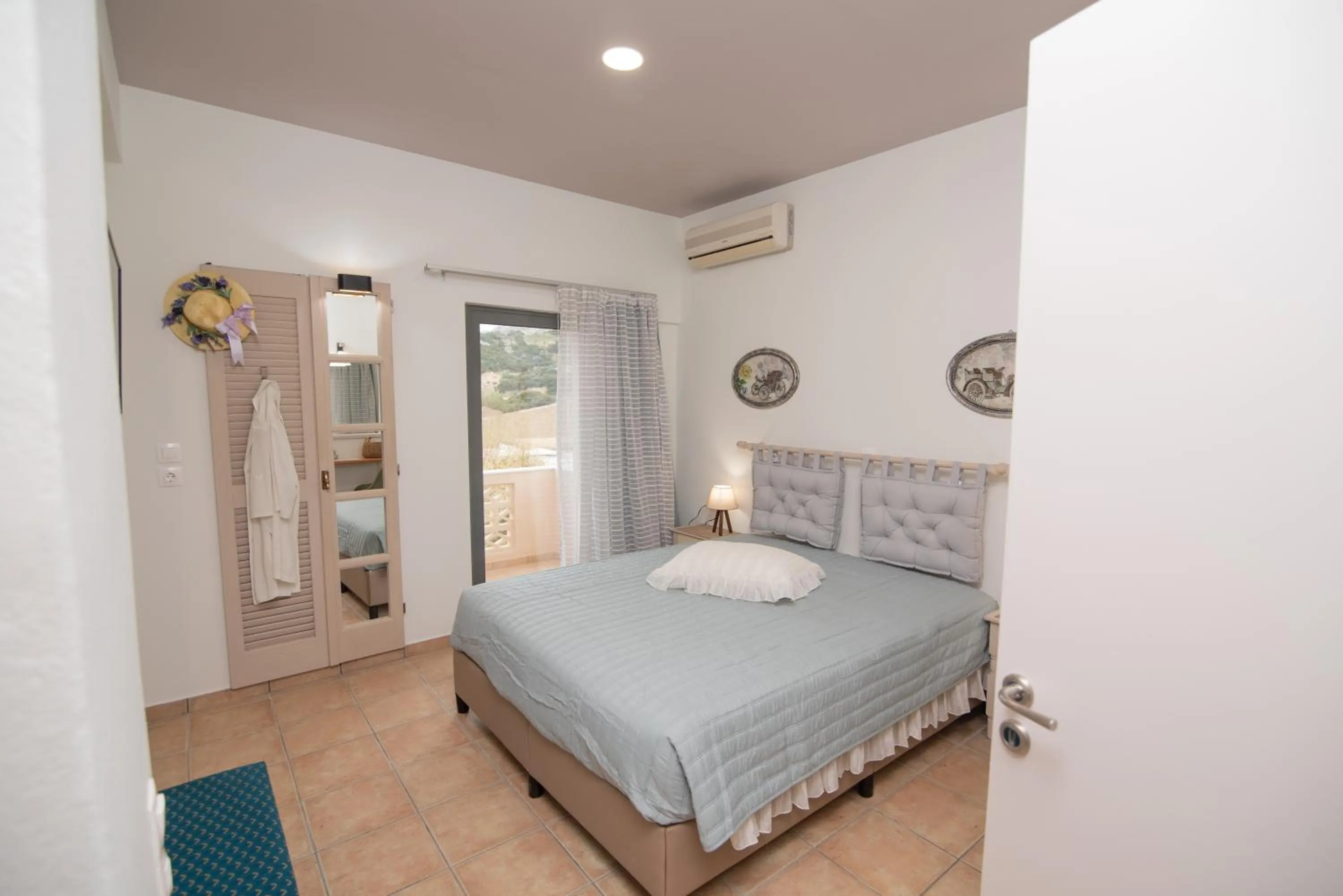 Bed in Tsaner Apartment and Rooms