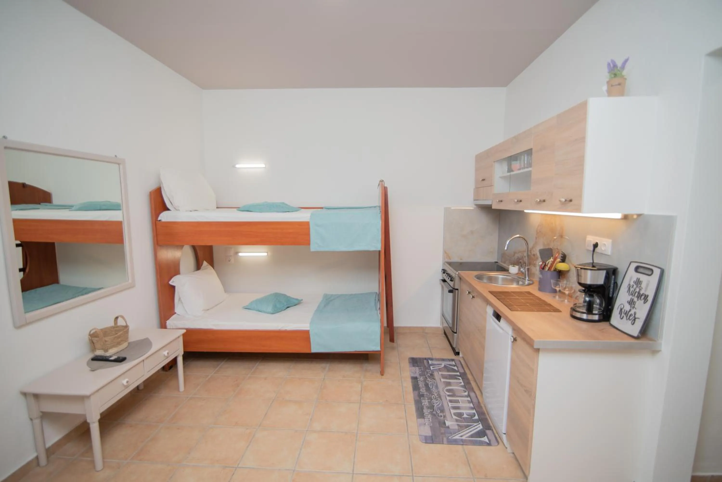 kitchen, Bed in Tsaner Apartment and Rooms