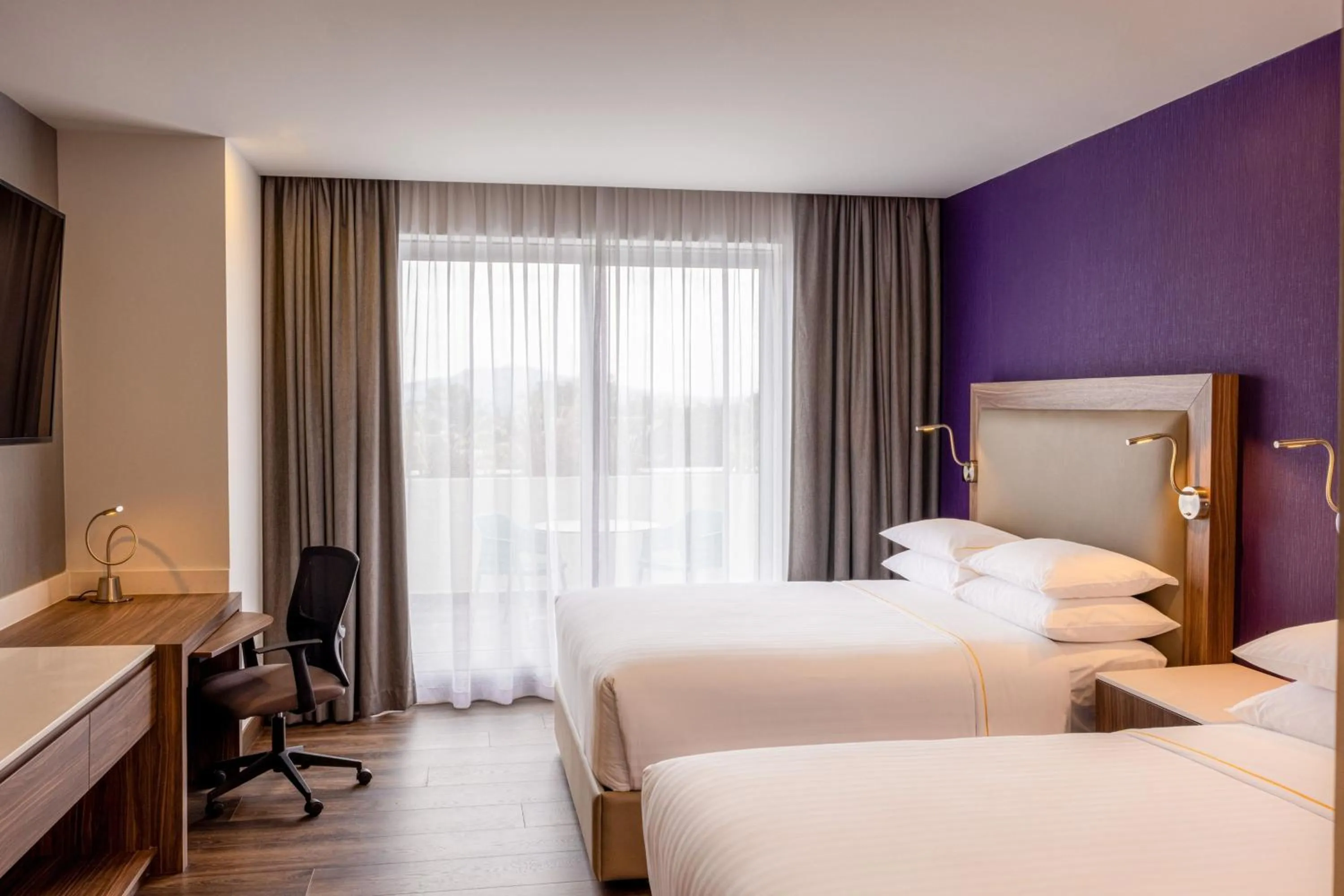 Photo of the whole room, Bed in Sheraton Guadalajara Expo