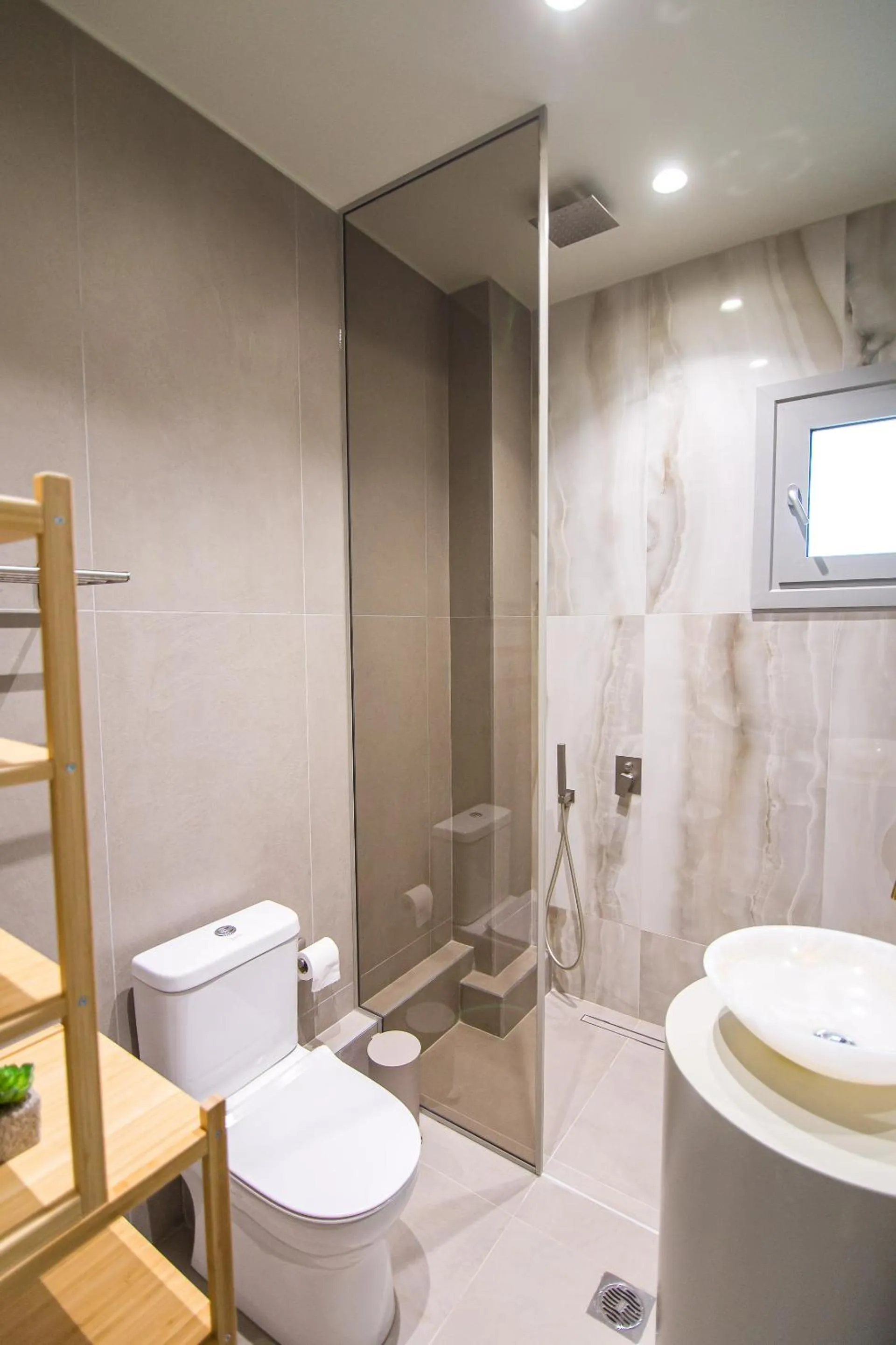 Shower in IO Luxury Pool & Hot Tub Suites