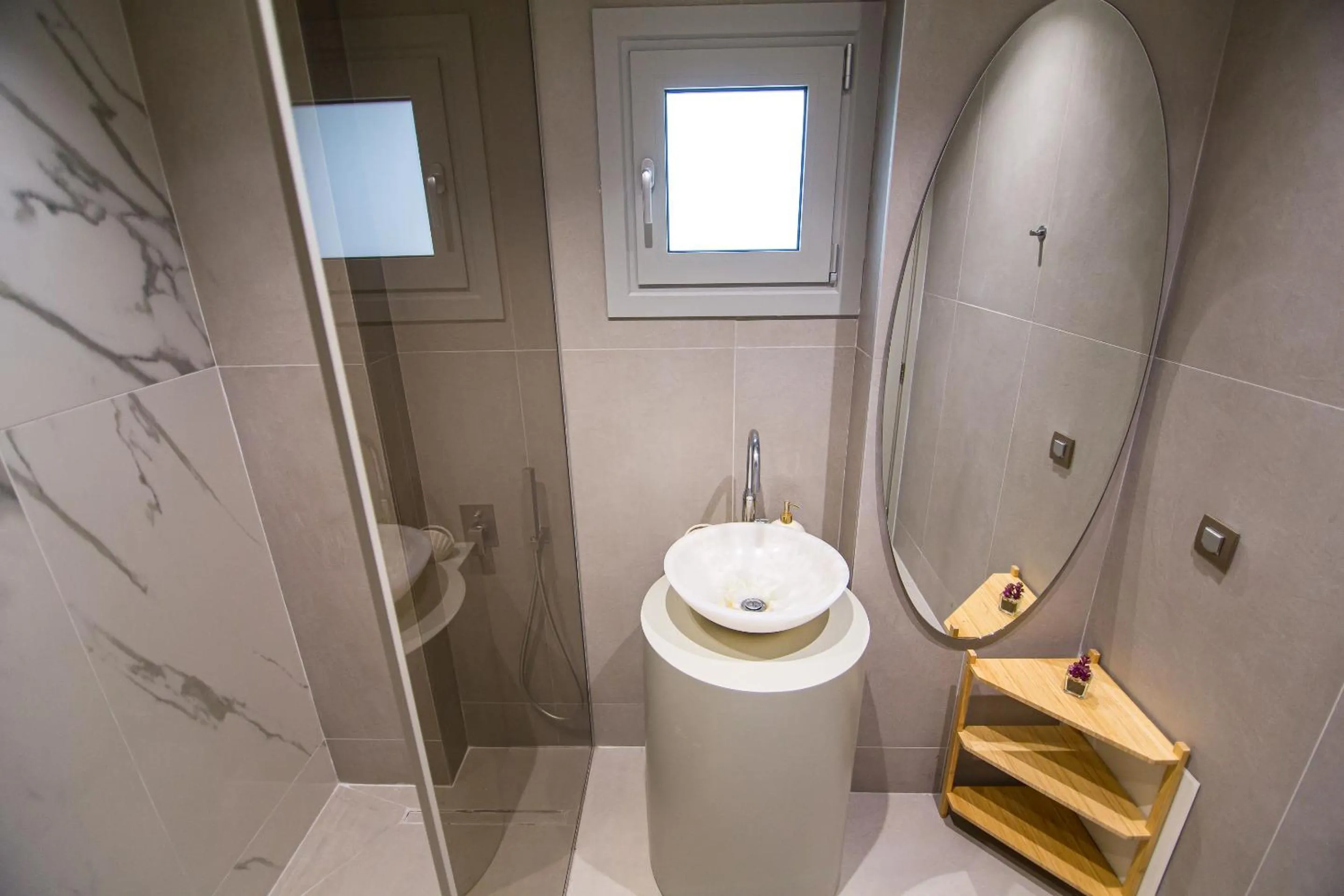 Shower in IO Luxury Pool & Hot Tub Suites