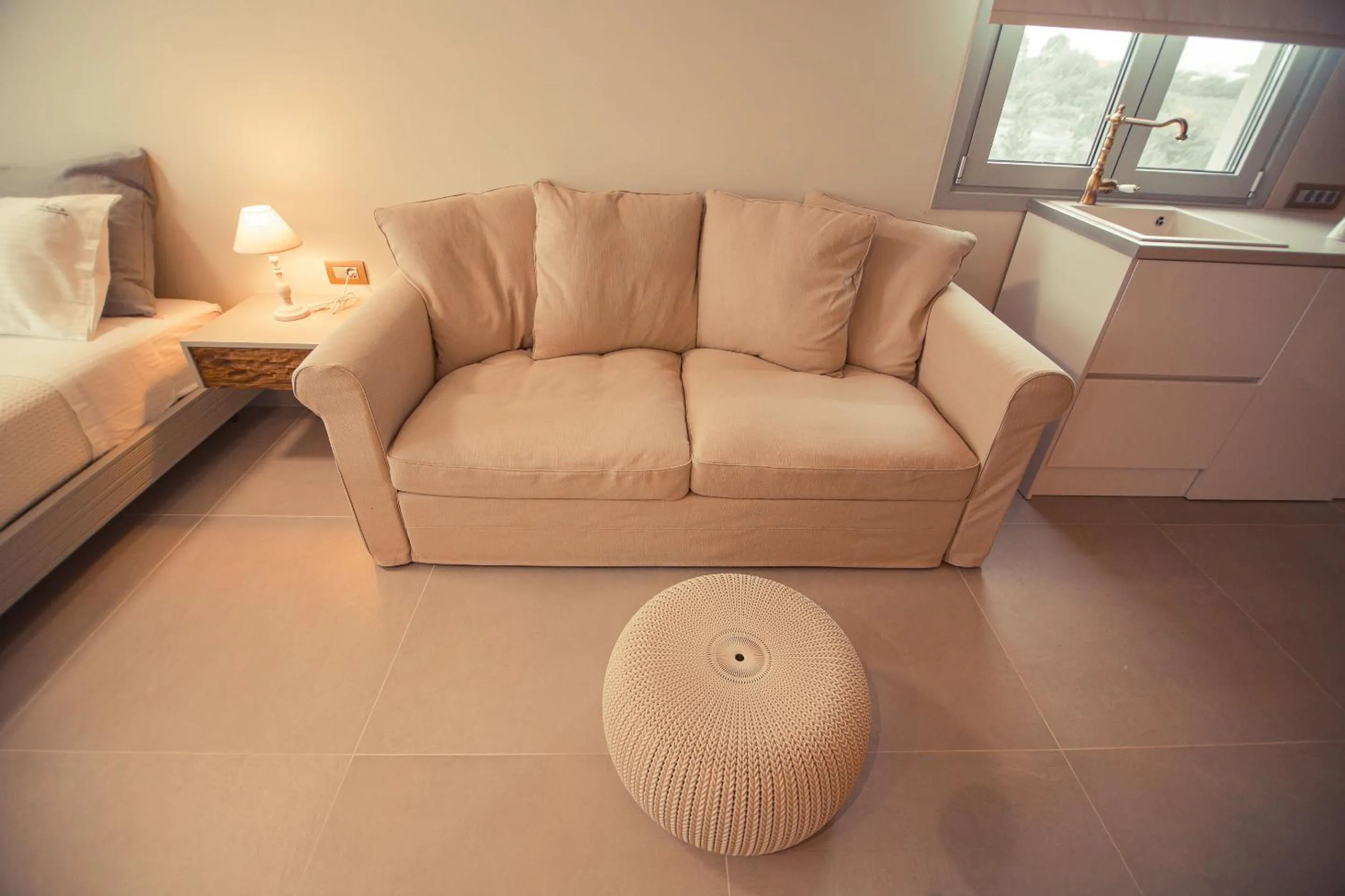 Seating area in IO Luxury Pool & Hot Tub Suites