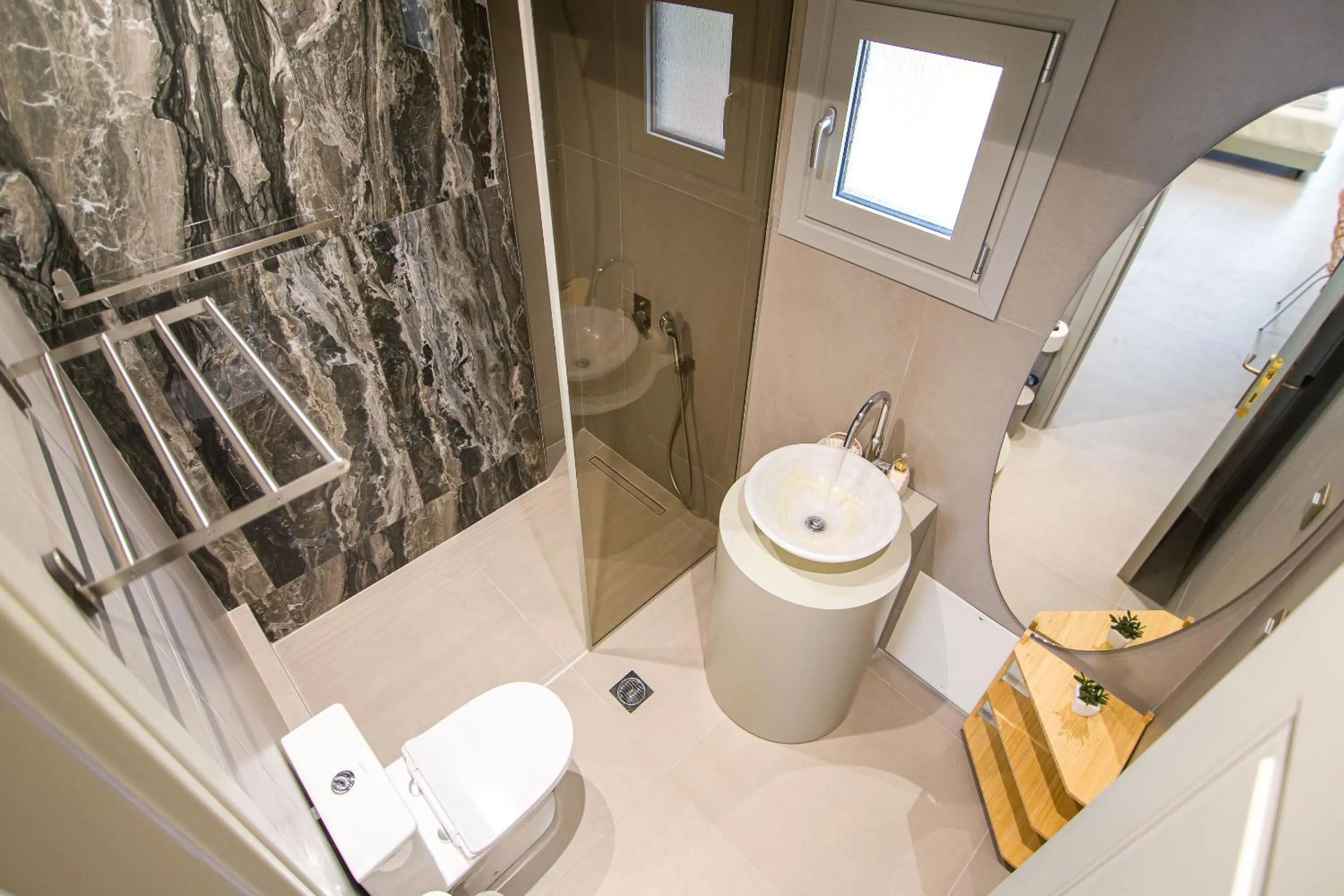 Shower in IO Luxury Pool & Hot Tub Suites