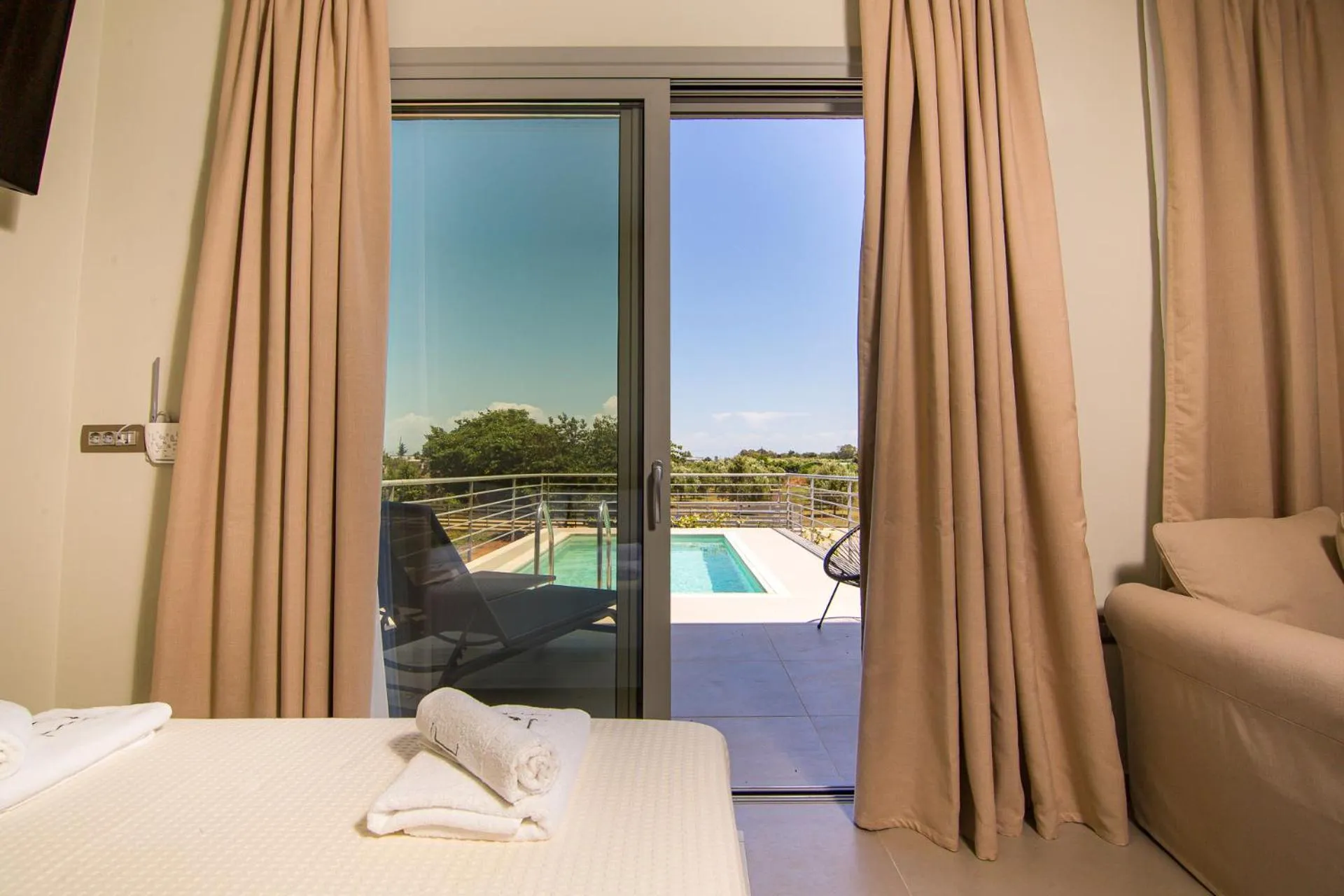 Natural landscape, Bed in IO Luxury Pool & Hot Tub Suites