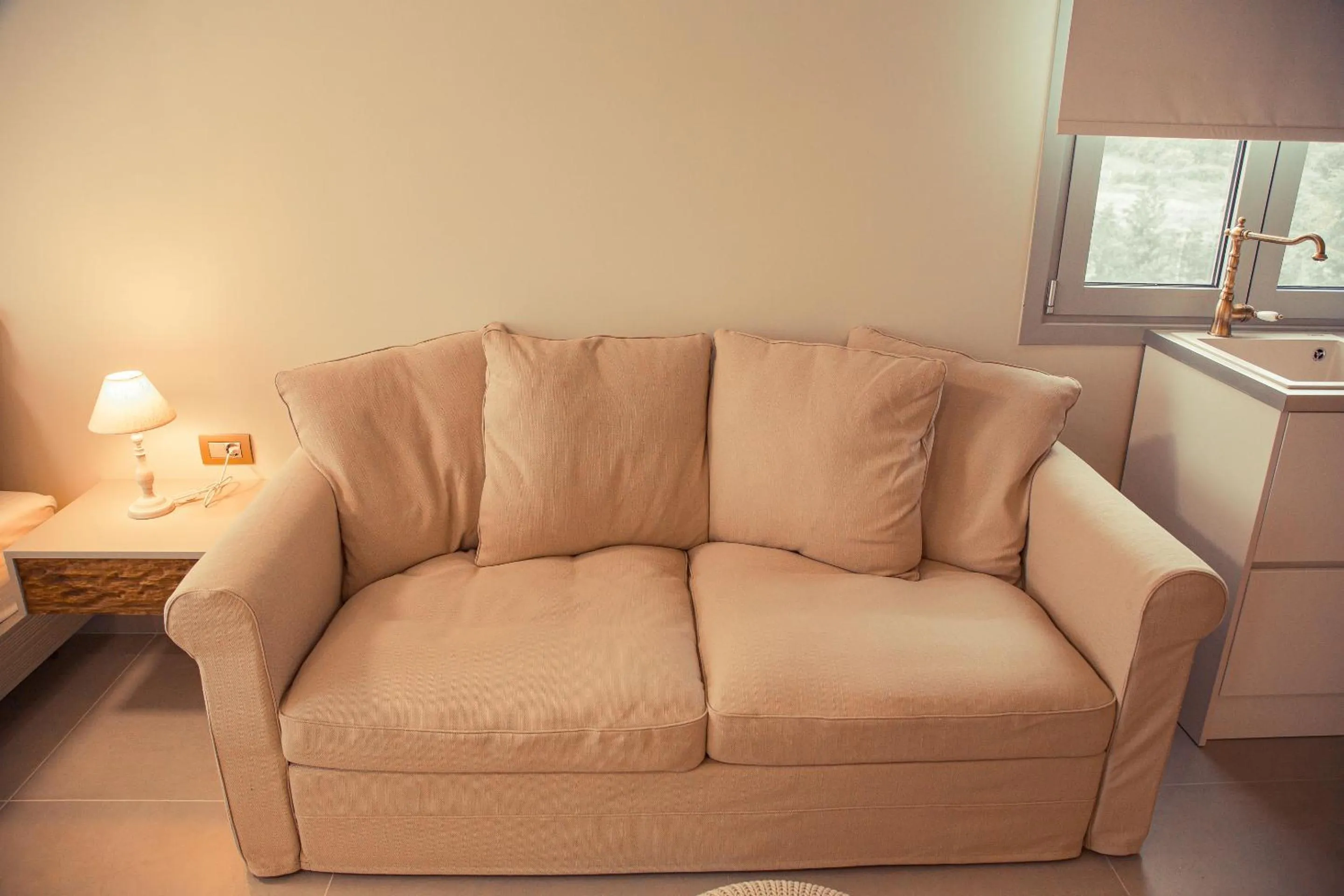 Seating area in IO Luxury Pool & Hot Tub Suites