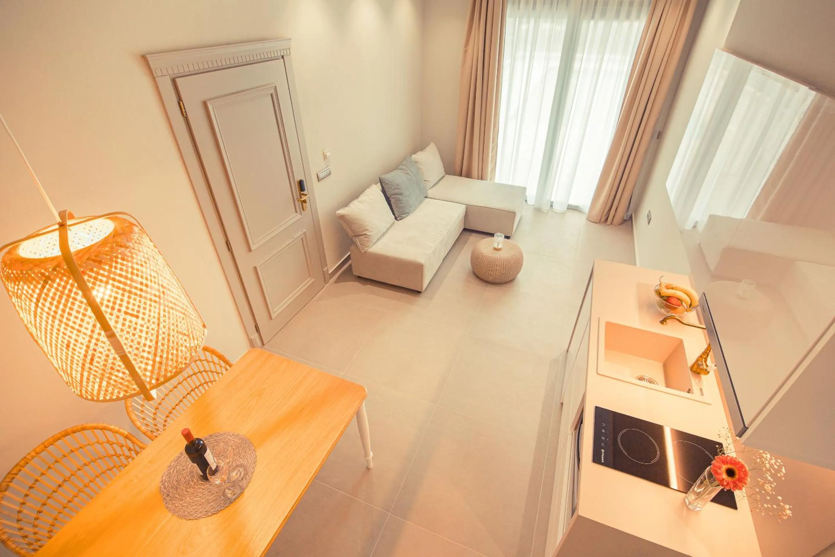 Living room, Bed in IO Luxury Pool & Hot Tub Suites