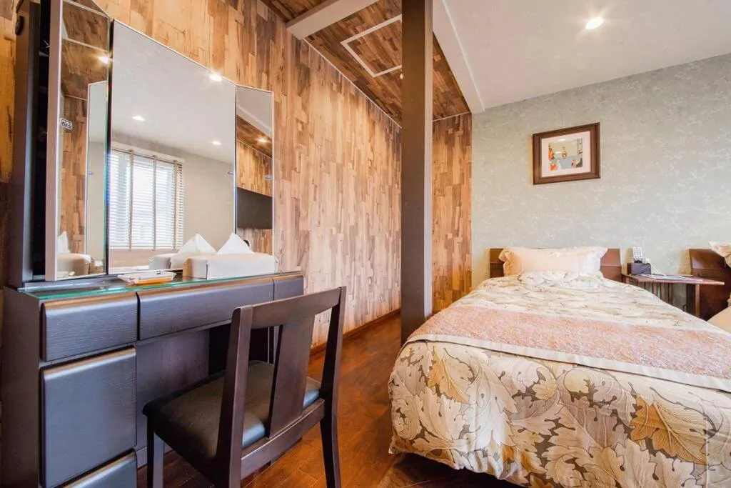 Bed in THE BLAUBAUM TOYA