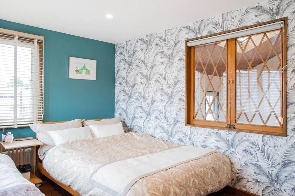 Bed in THE BLAUBAUM TOYA