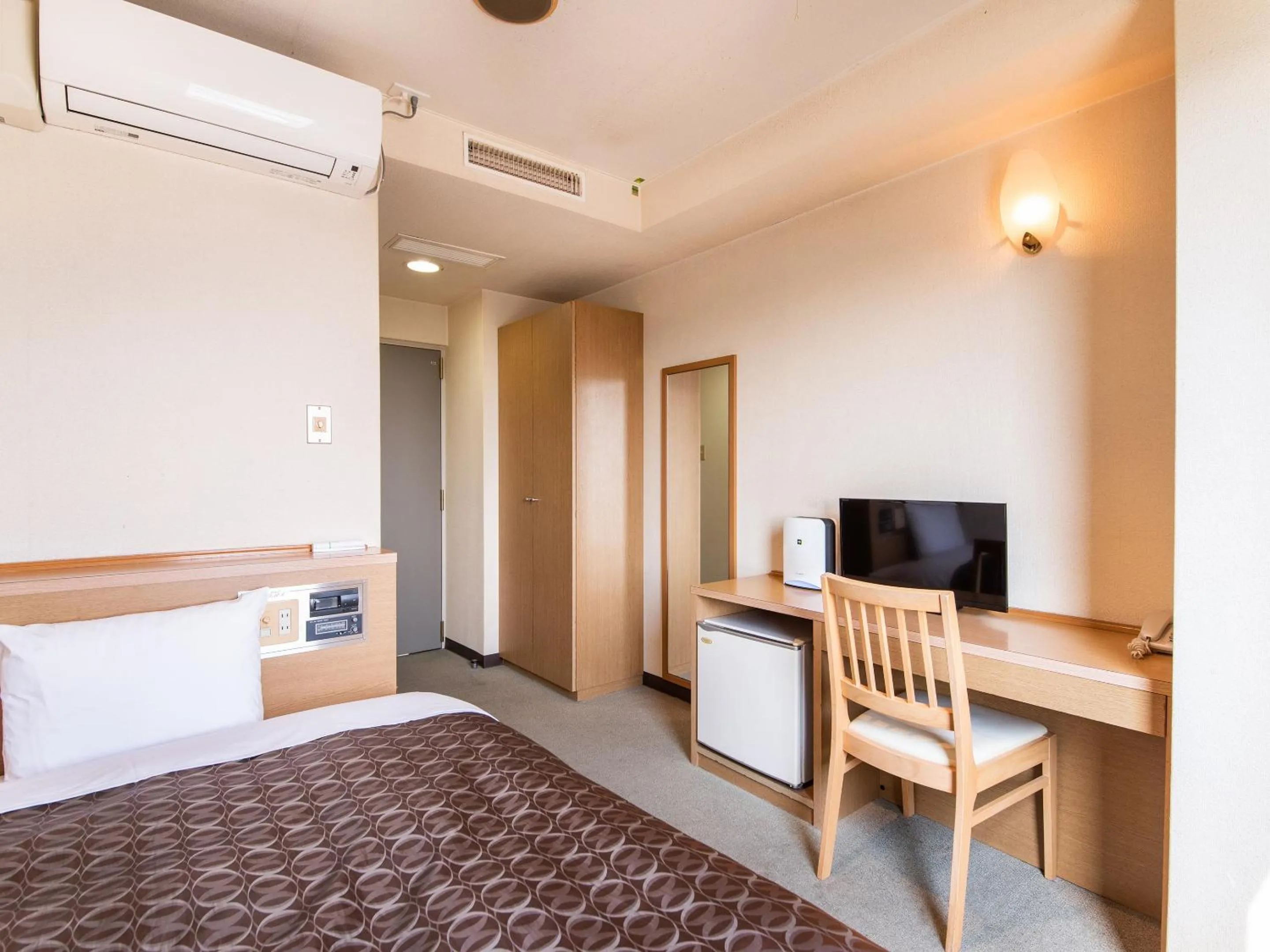 Photo of the whole room, Bed in Hotel Primrose Saito