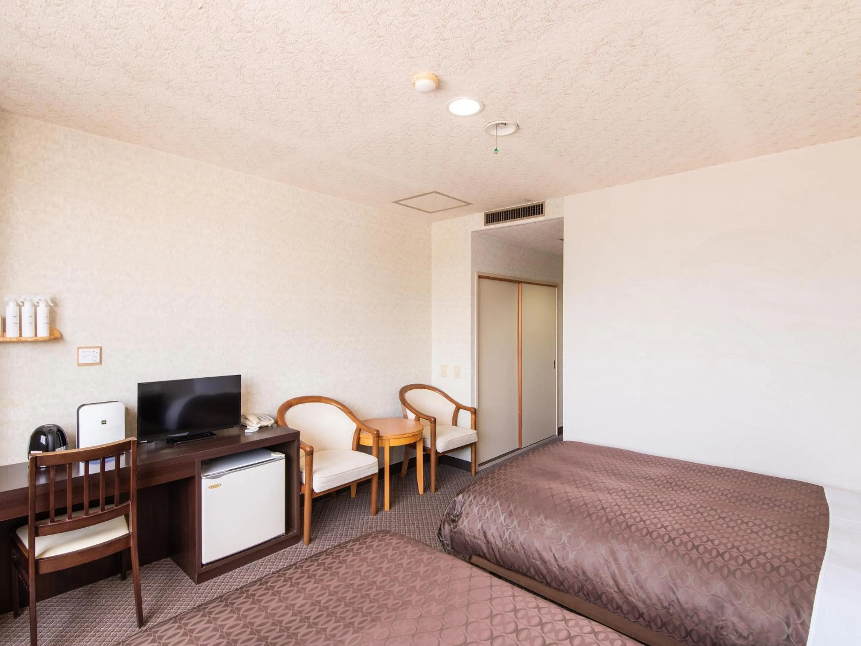 Photo of the whole room, Bed in Hotel Primrose Saito