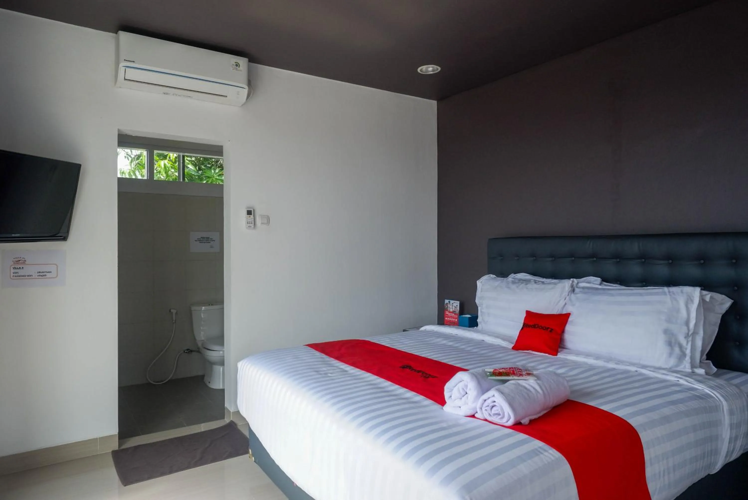Bed in RedDoorz near Bukitsari Semarang