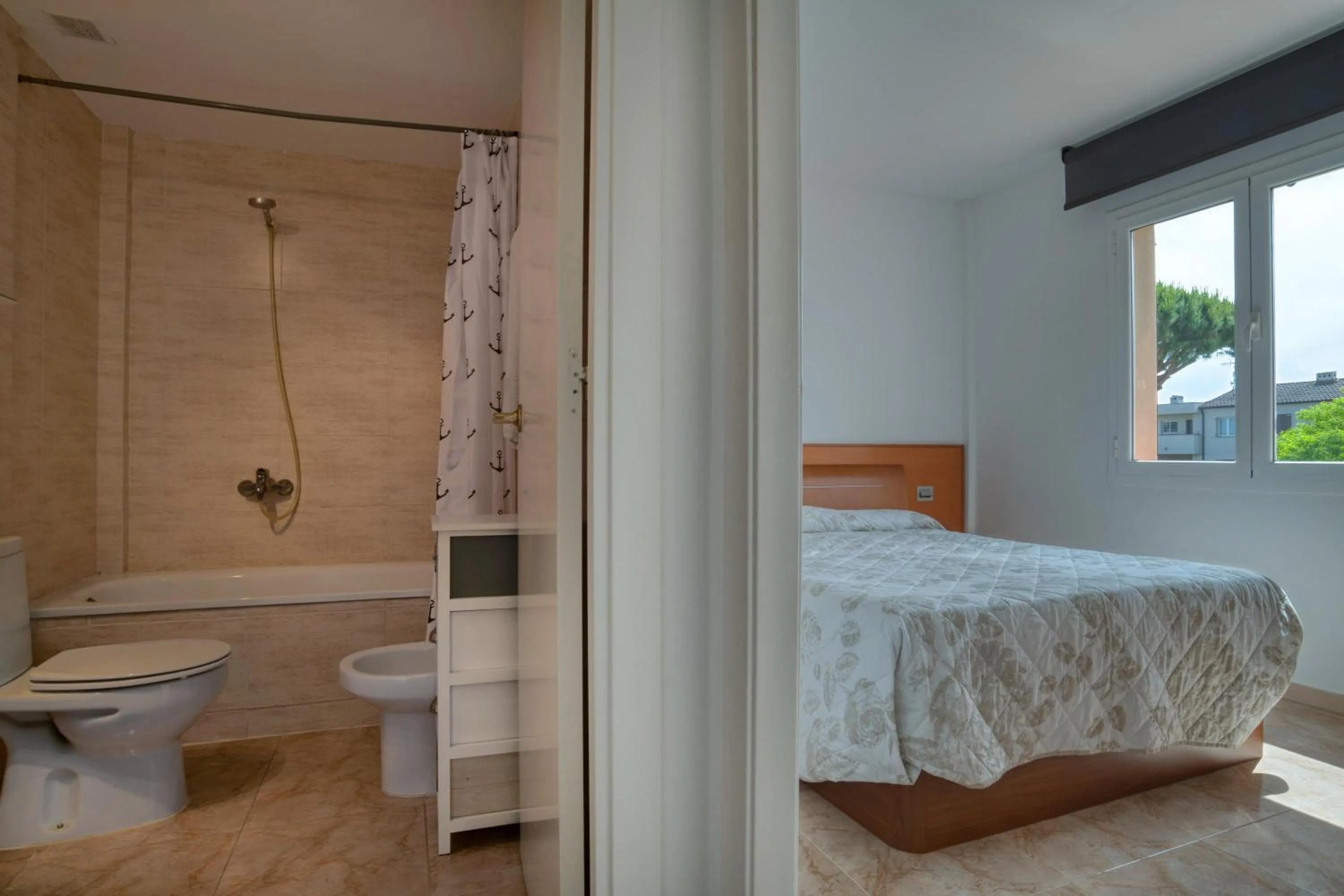 Living room, Bed in Apartament a Sant Antoni de Calonge