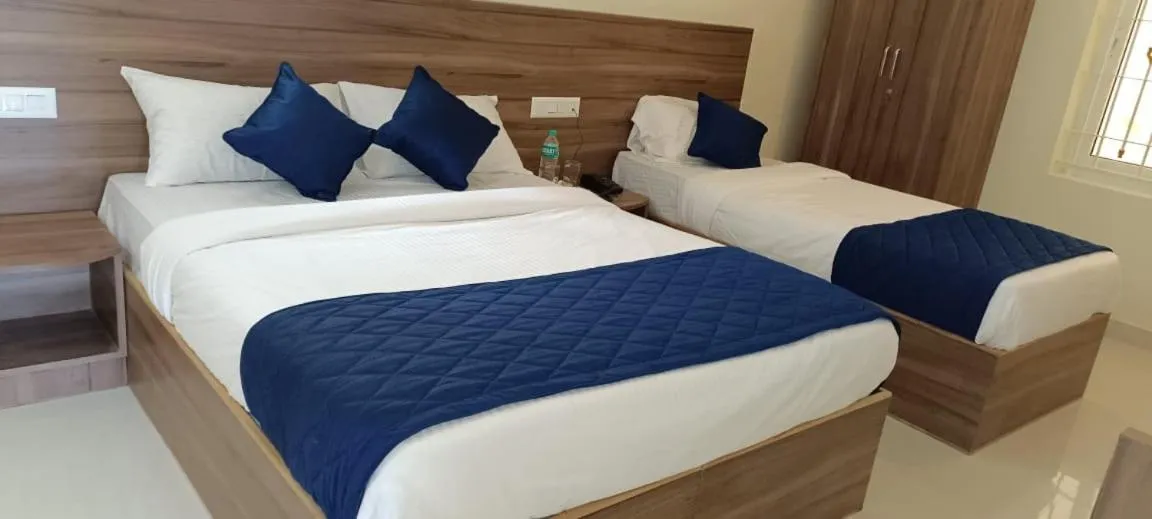 Photo of the whole room, Bed in NJK Residency