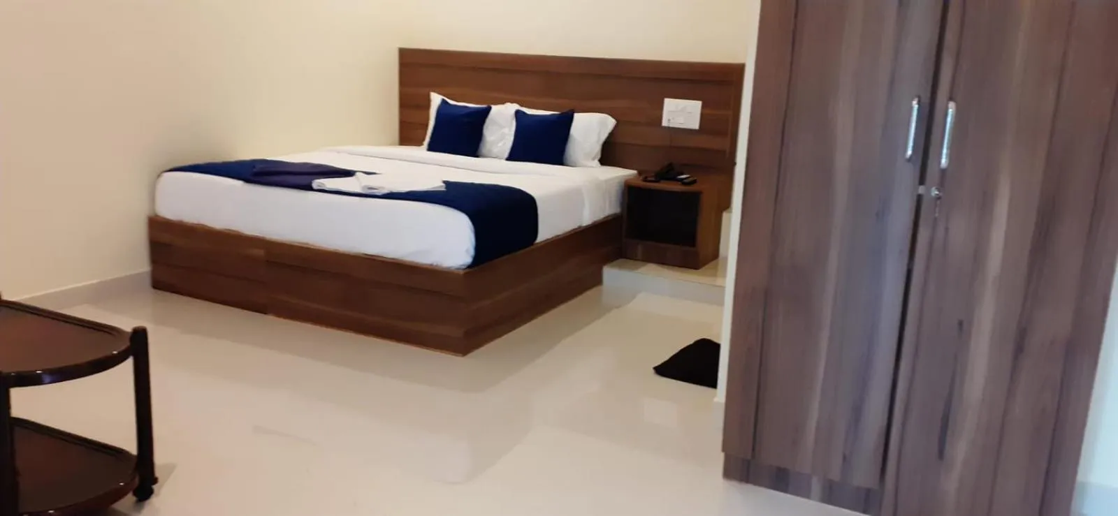 Photo of the whole room, Bed in NJK Residency