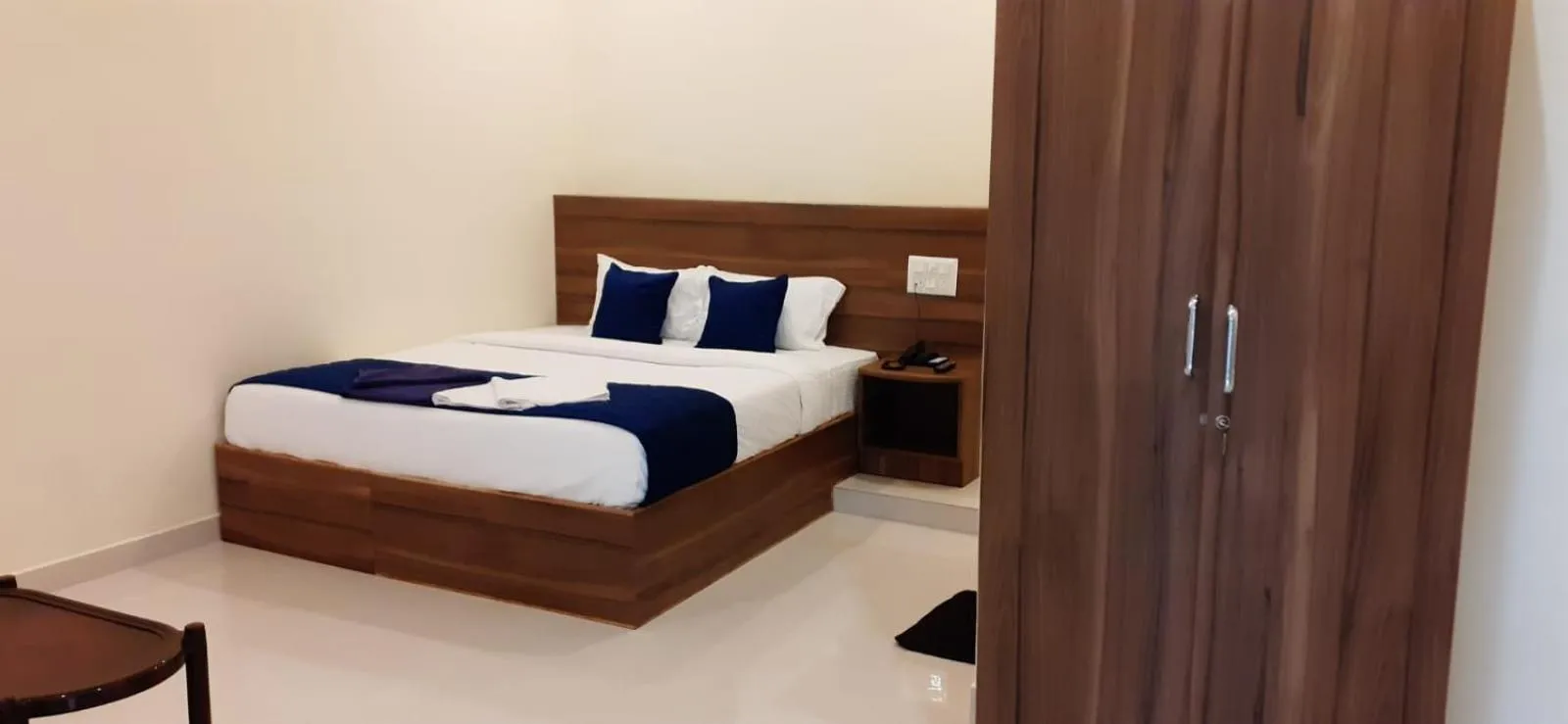 Photo of the whole room, Bed in NJK Residency