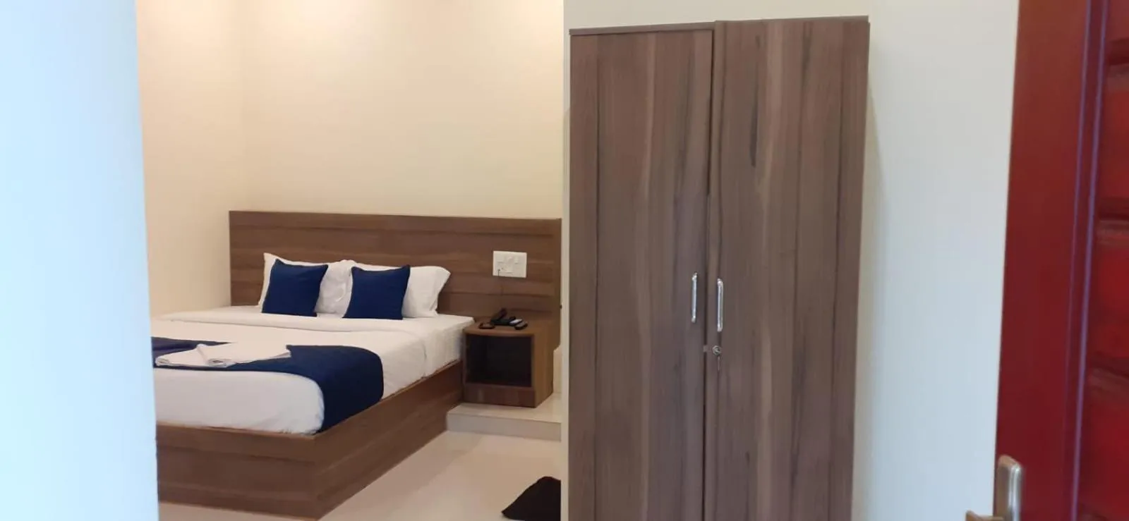 Photo of the whole room, Bed in NJK Residency