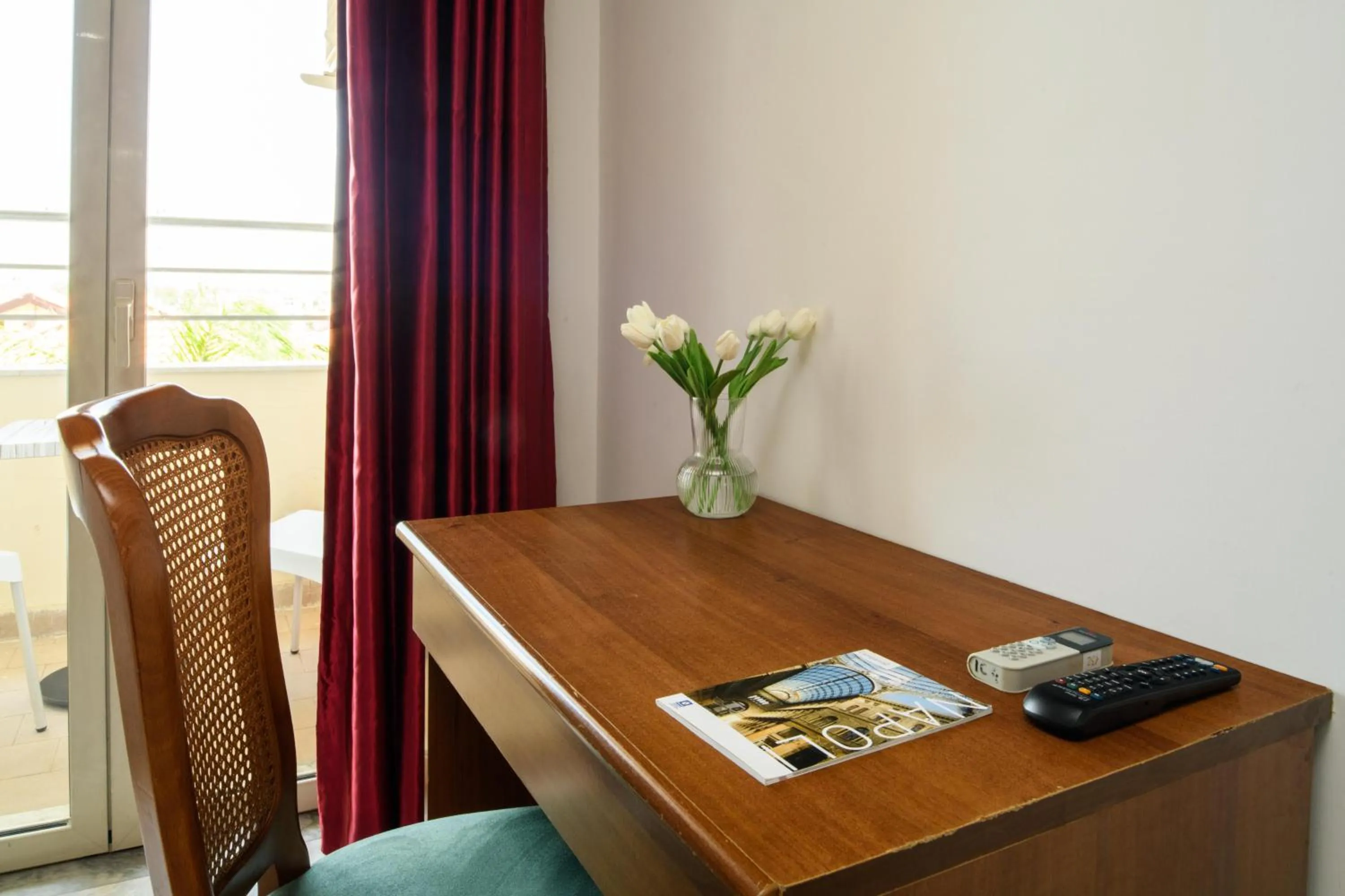 Bedroom in Hotel La Mela