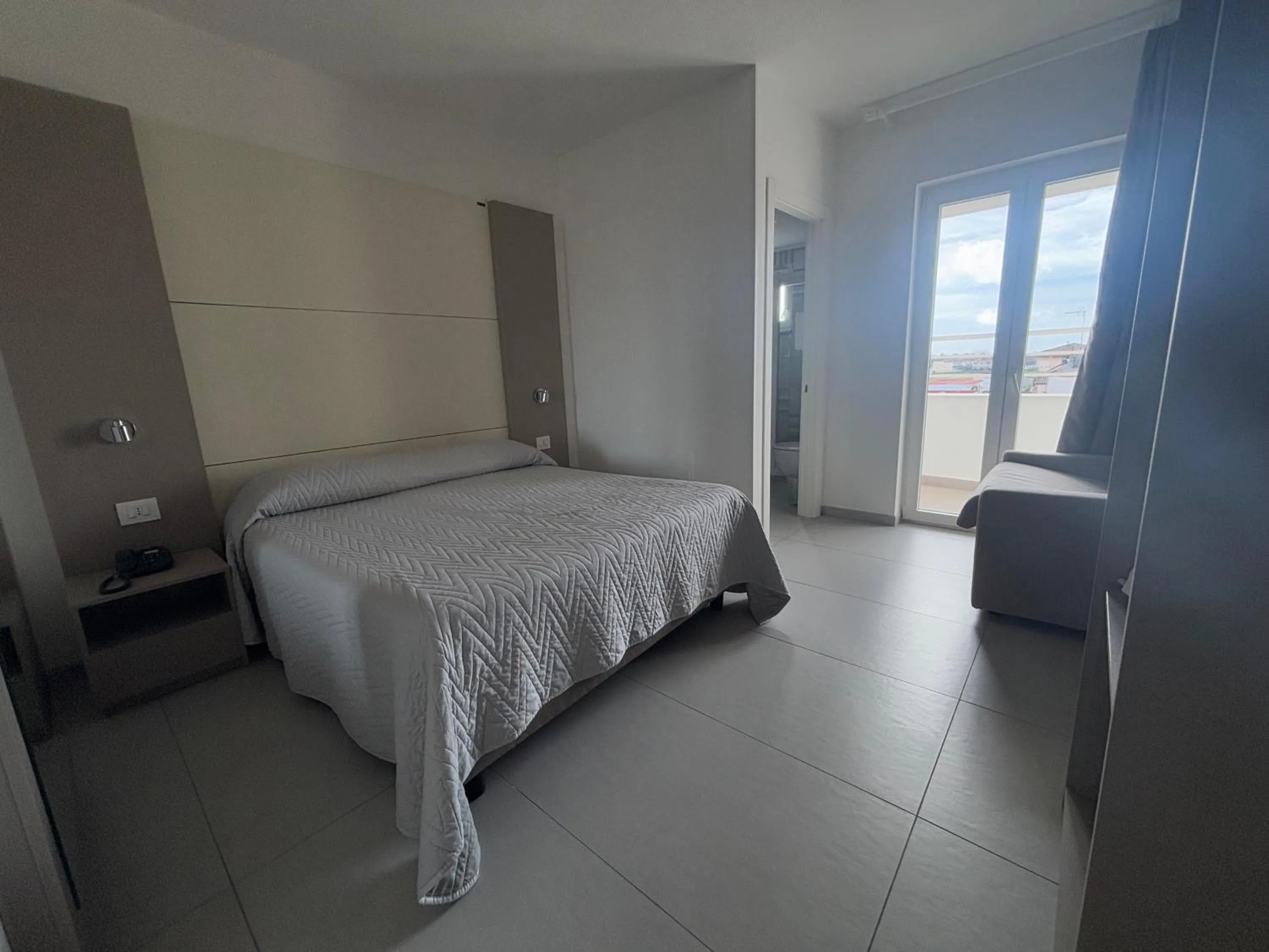 Photo of the whole room, Bed in Hotel La Mela