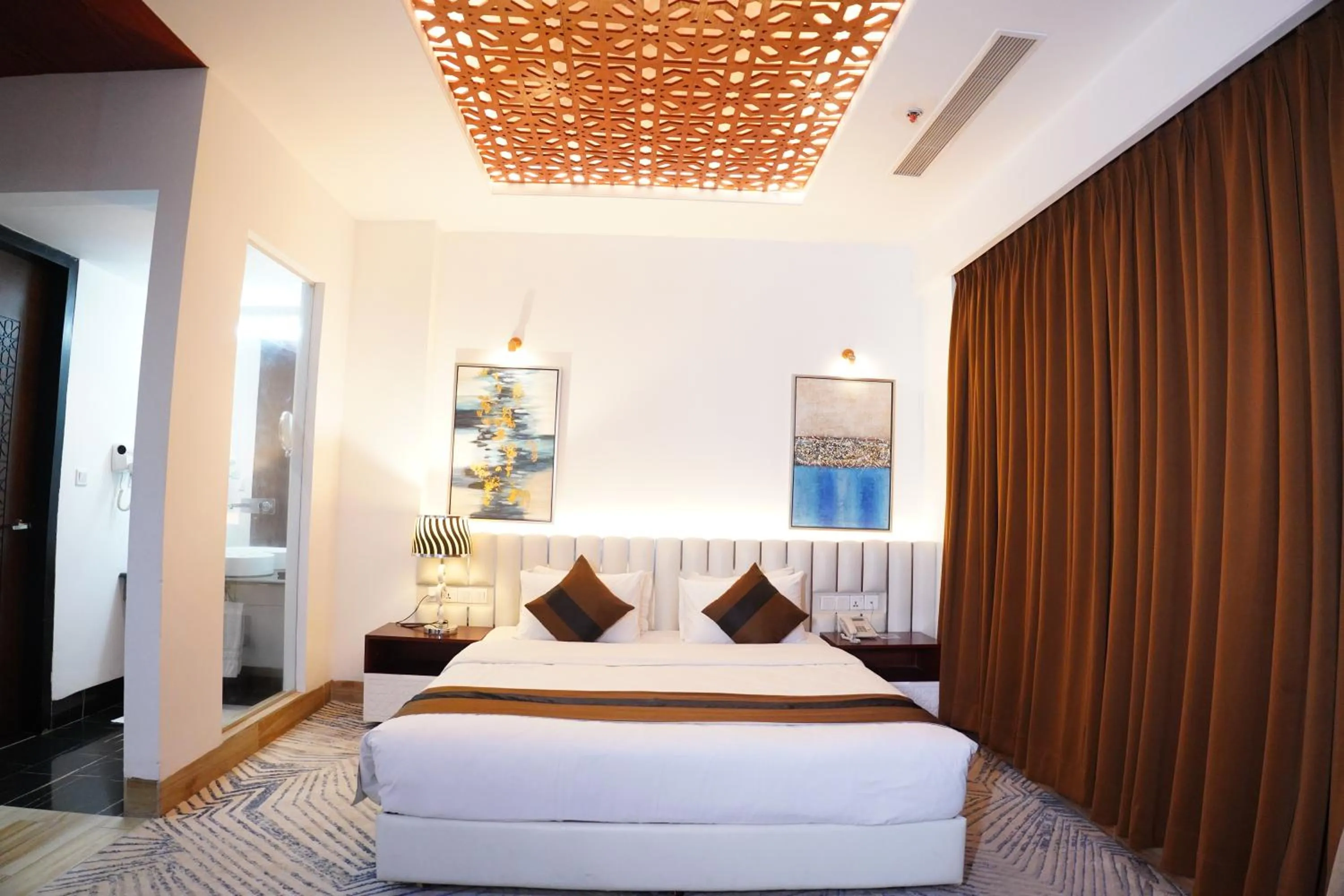 Bedroom, Bed in Empyrean Dhaka City Centre