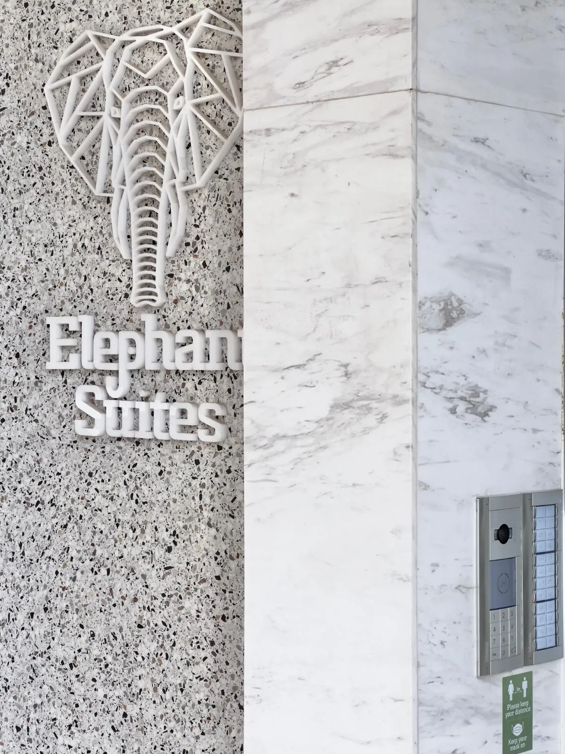 Property logo or sign in Elephant Suites