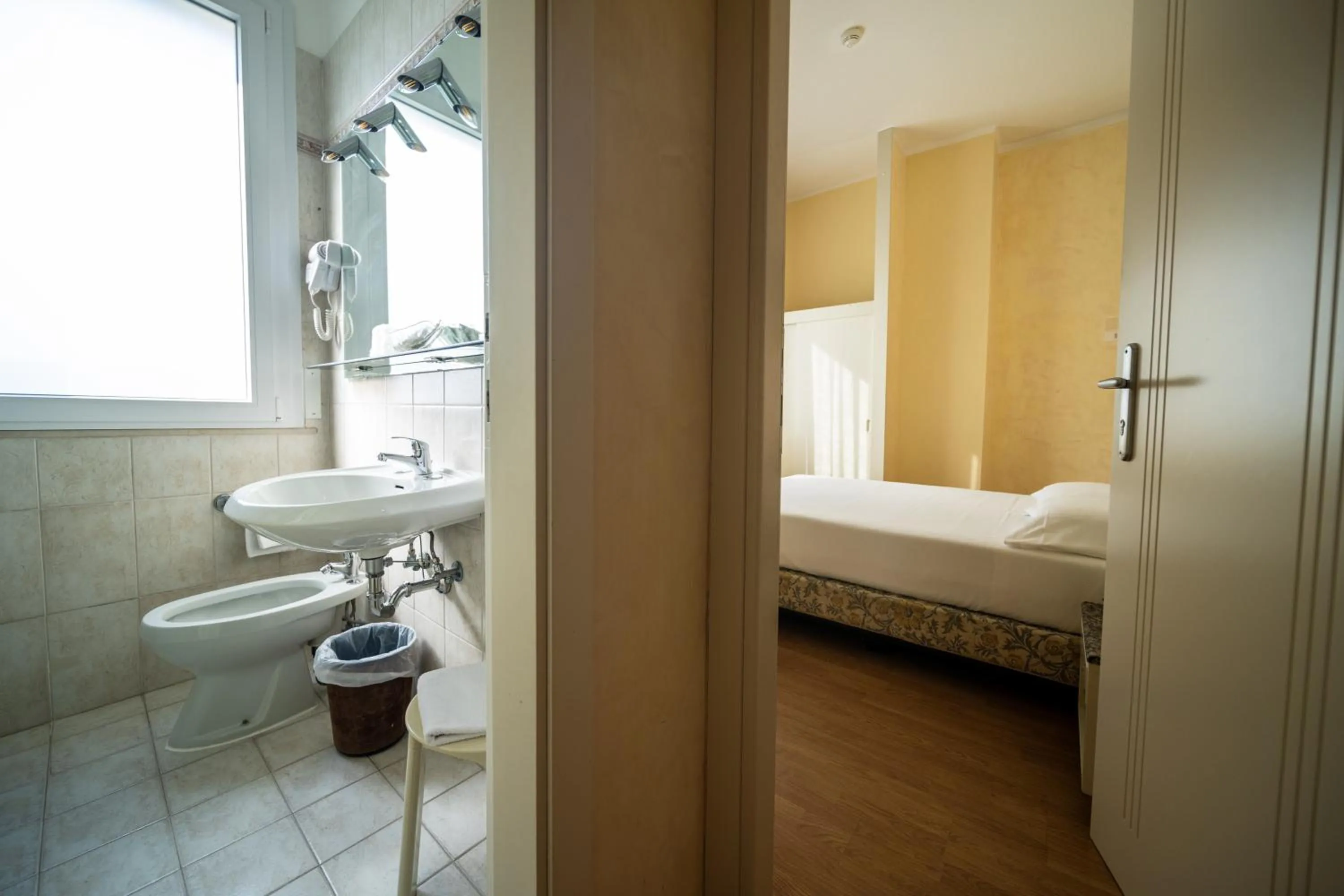 Toilet, Bed in Hotel Rosabianca