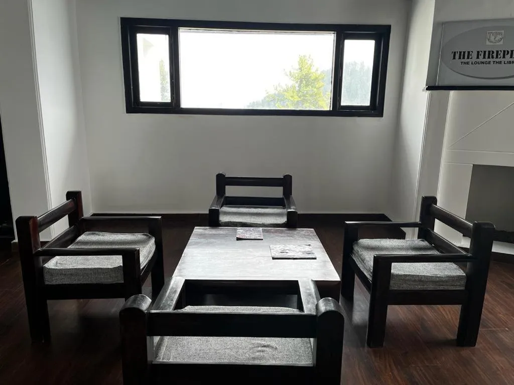 Seating area, Bed in Tethys Himalaya Narkanda