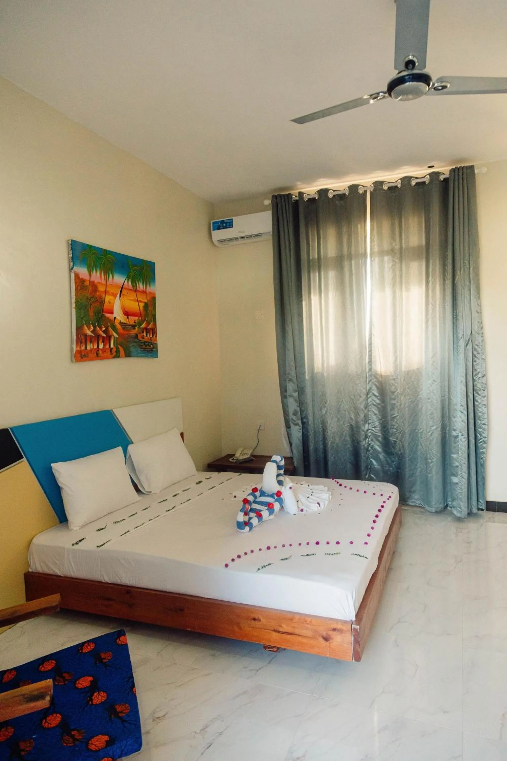 Bed in Ocean Breeze Hotel