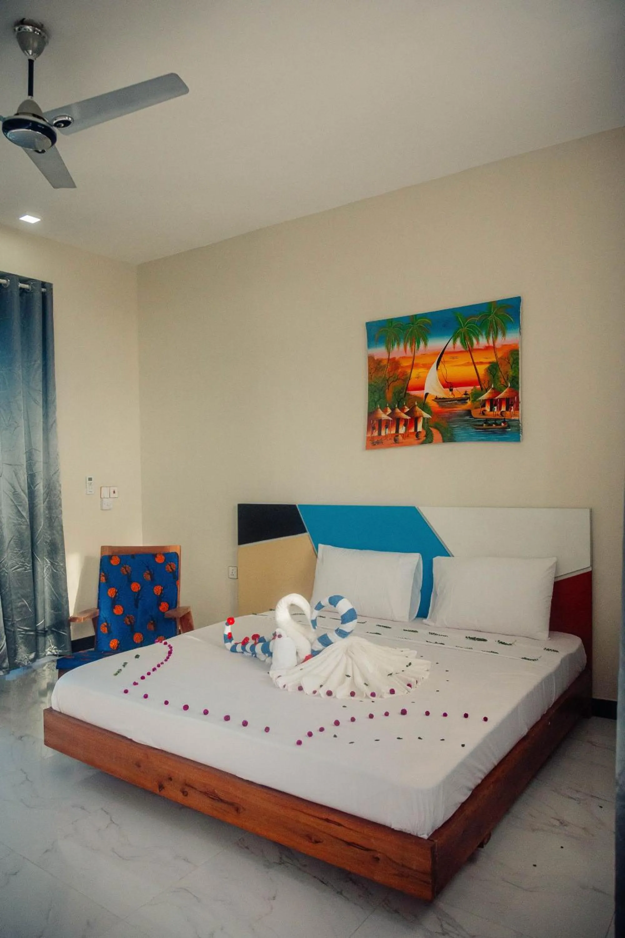 Bed in Ocean Breeze Hotel