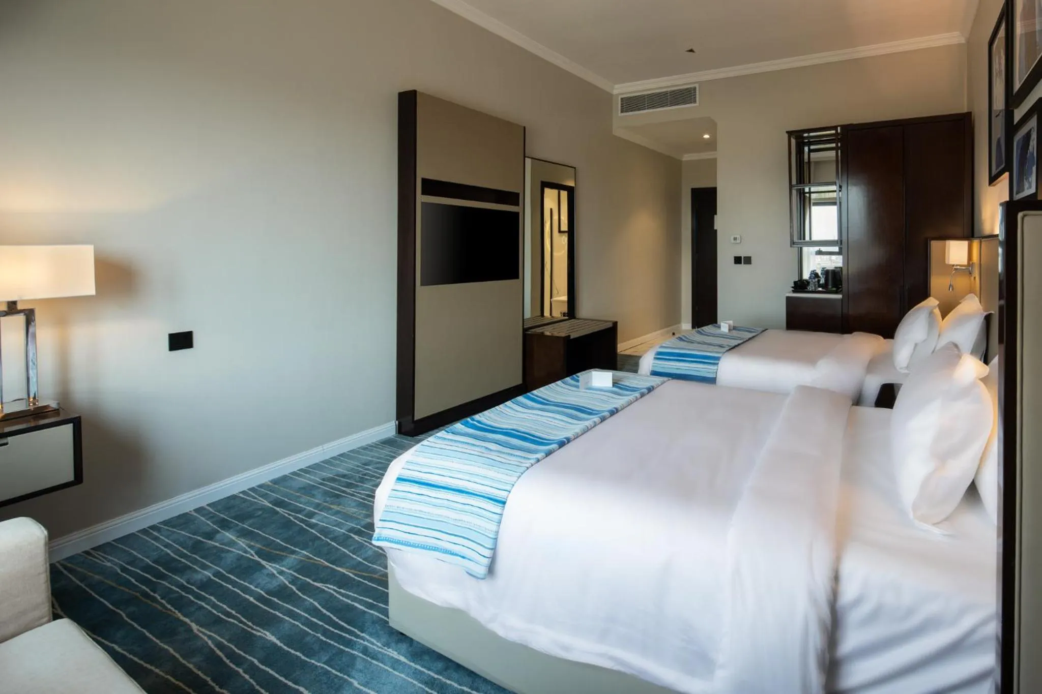 Bed in Prime Al Corniche Hotel