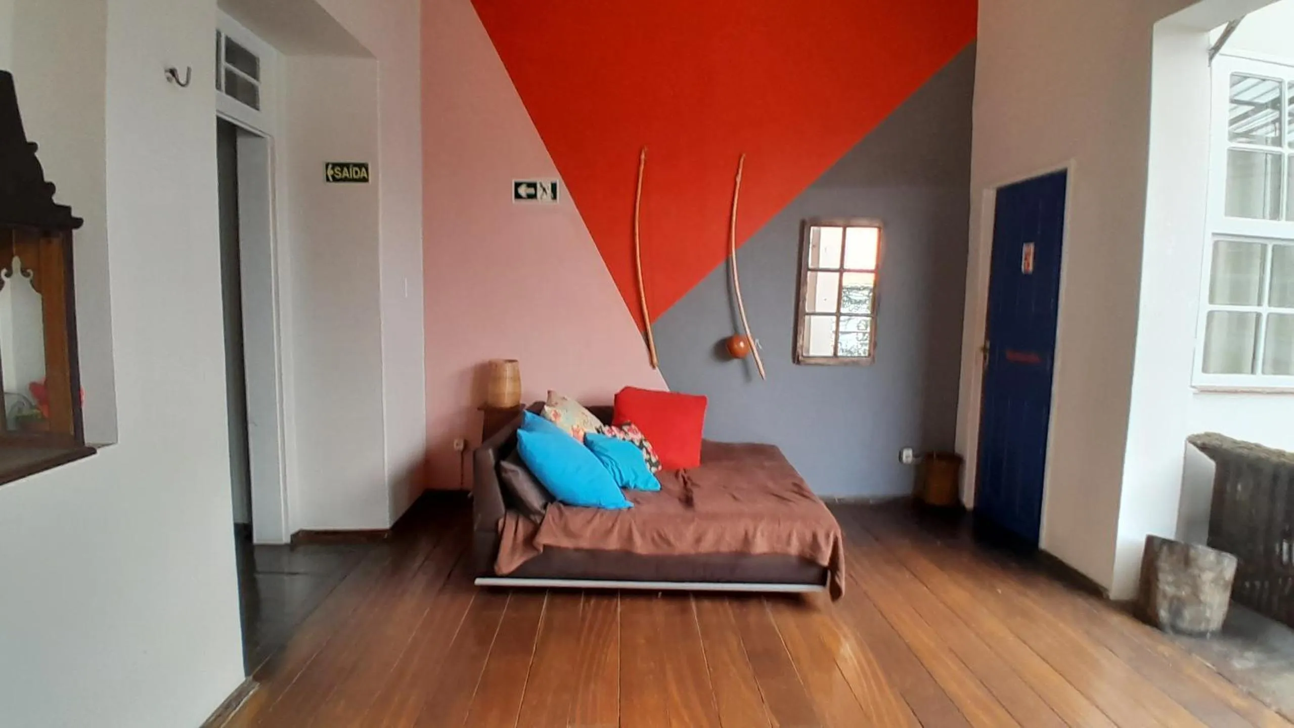 Seating area, Bed in Americo Pousada e Hostel