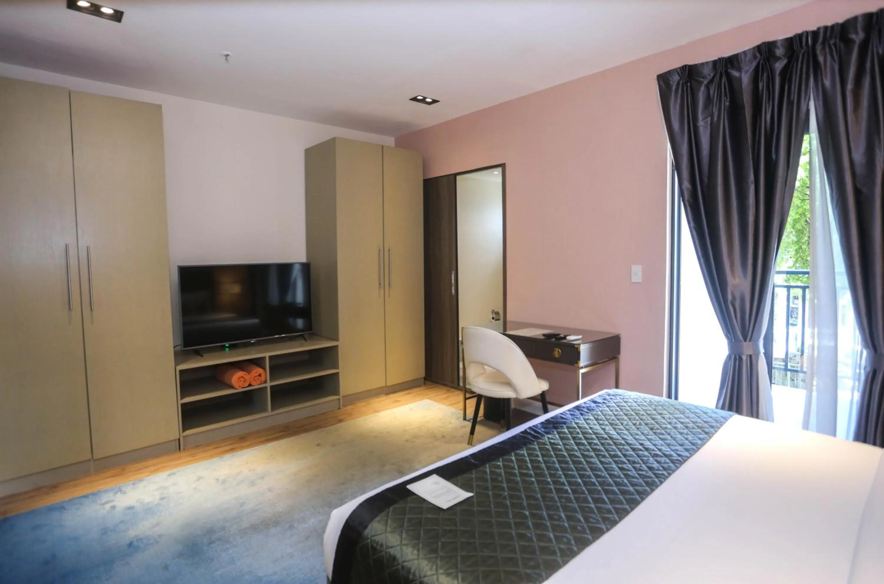 Bed in Noble Cebu Hotel