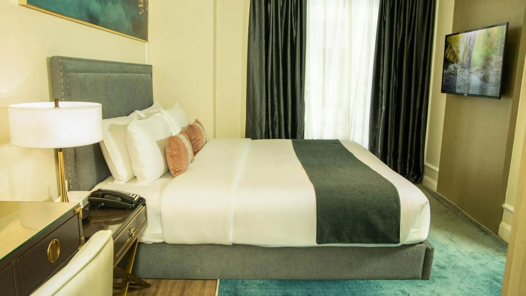 Bed in Noble Cebu Hotel