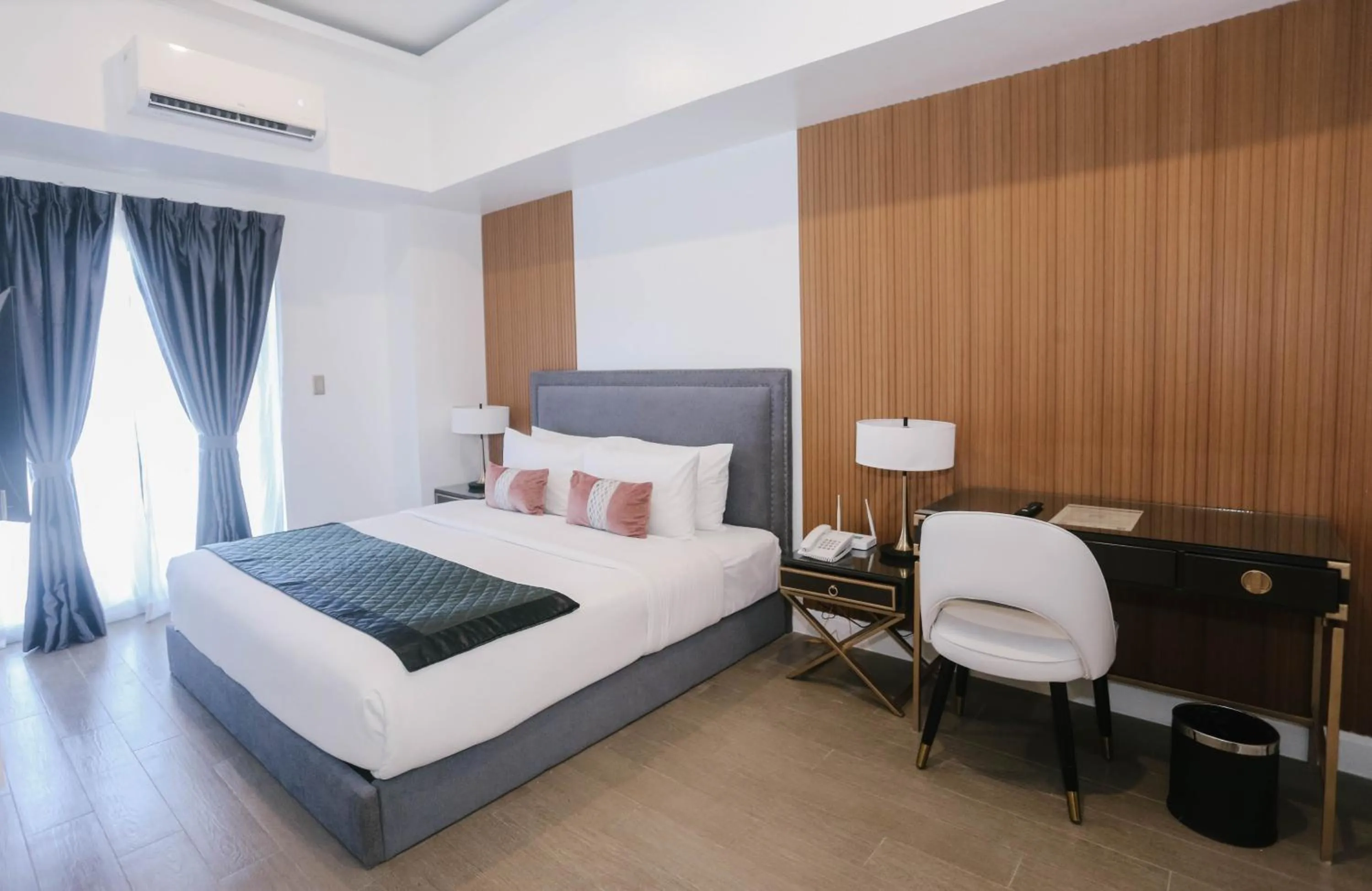 Bed in Noble Cebu Hotel