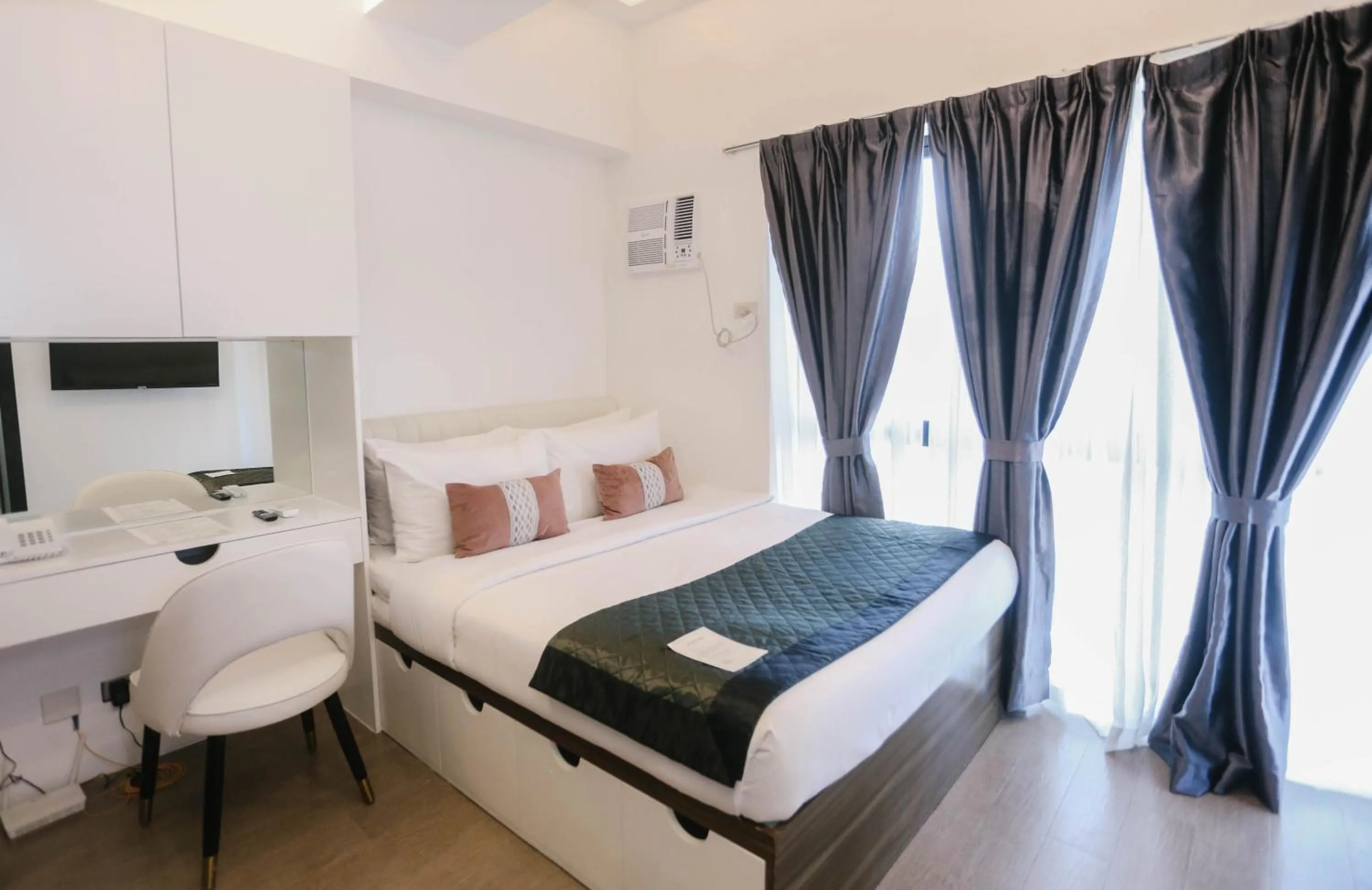 Bed in Noble Cebu Hotel