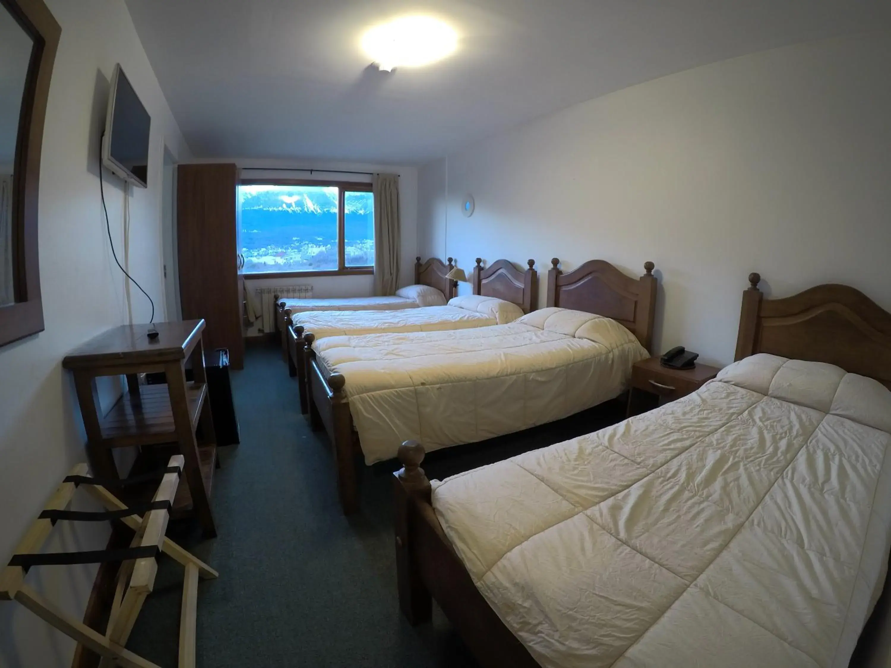 Quadruple Room with Mountain View in OIKOS Quadruple Room with Mountain View in OIKOS