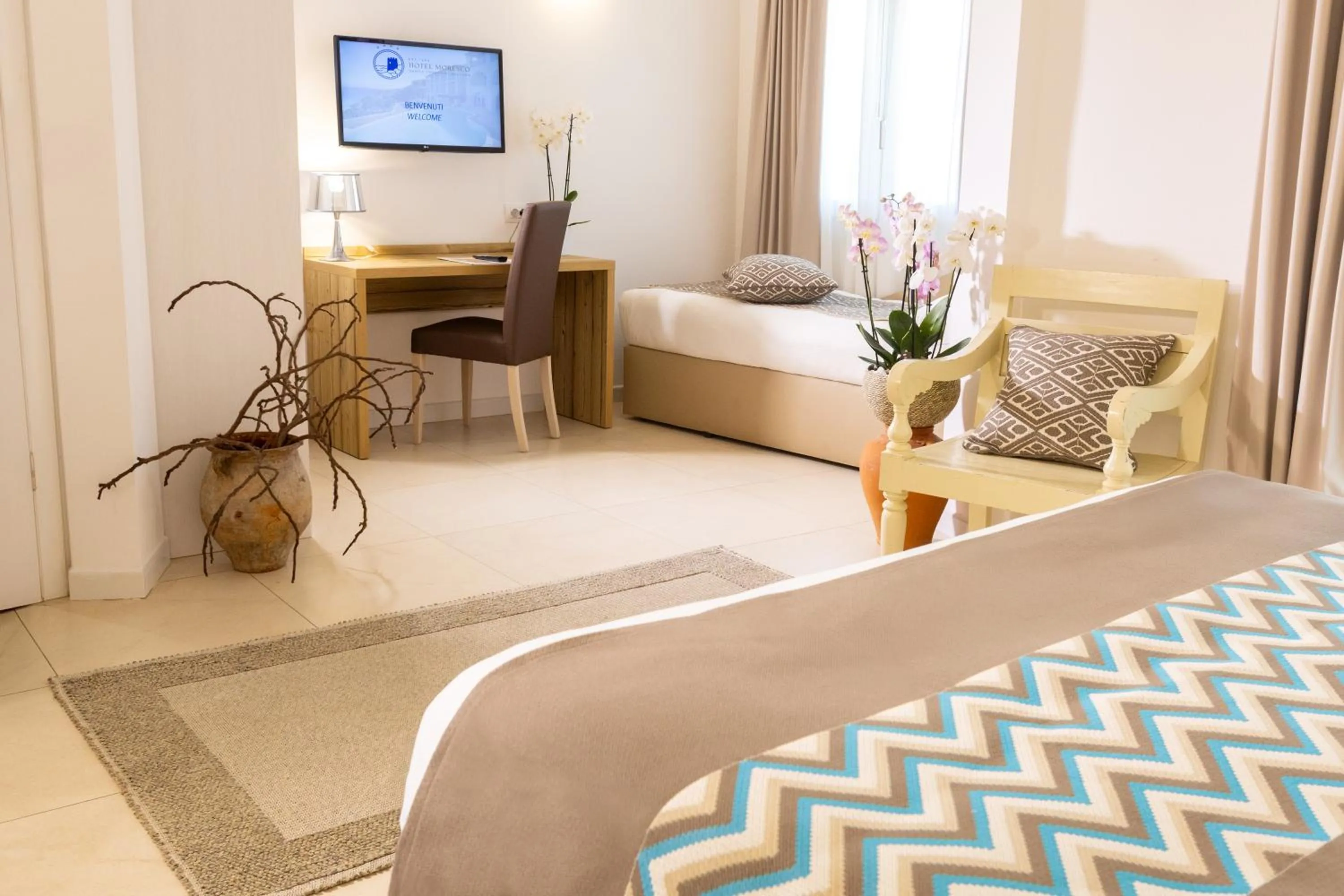 Bed in Hotel Moresco