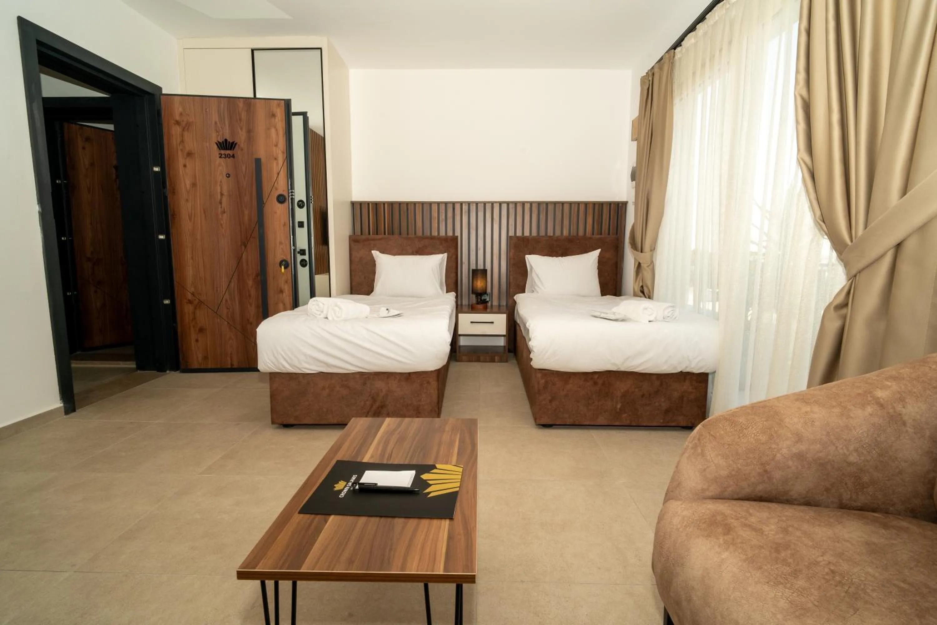 Bed in Crown Salamis Hotel