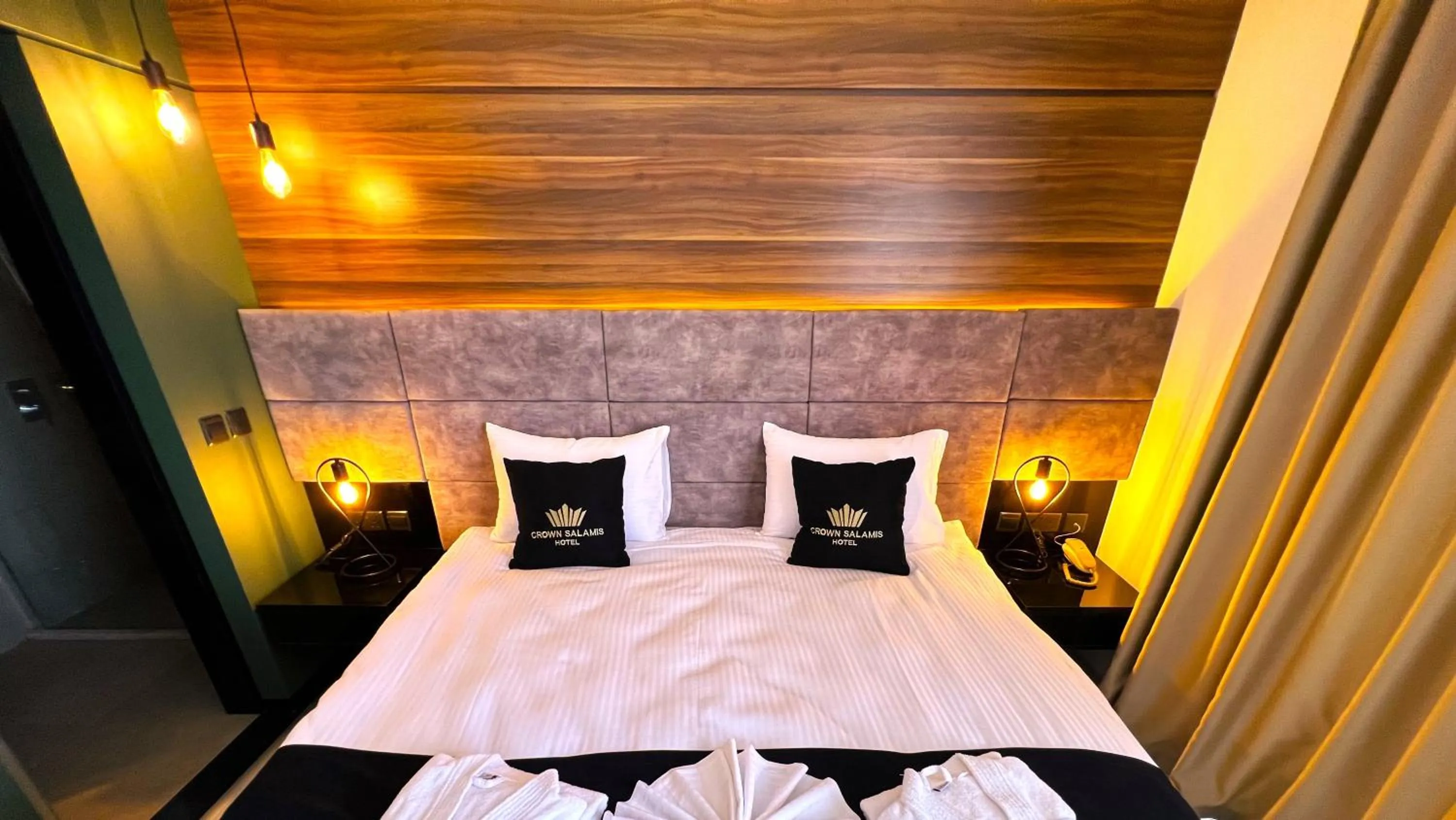 Bed in Crown Salamis Hotel